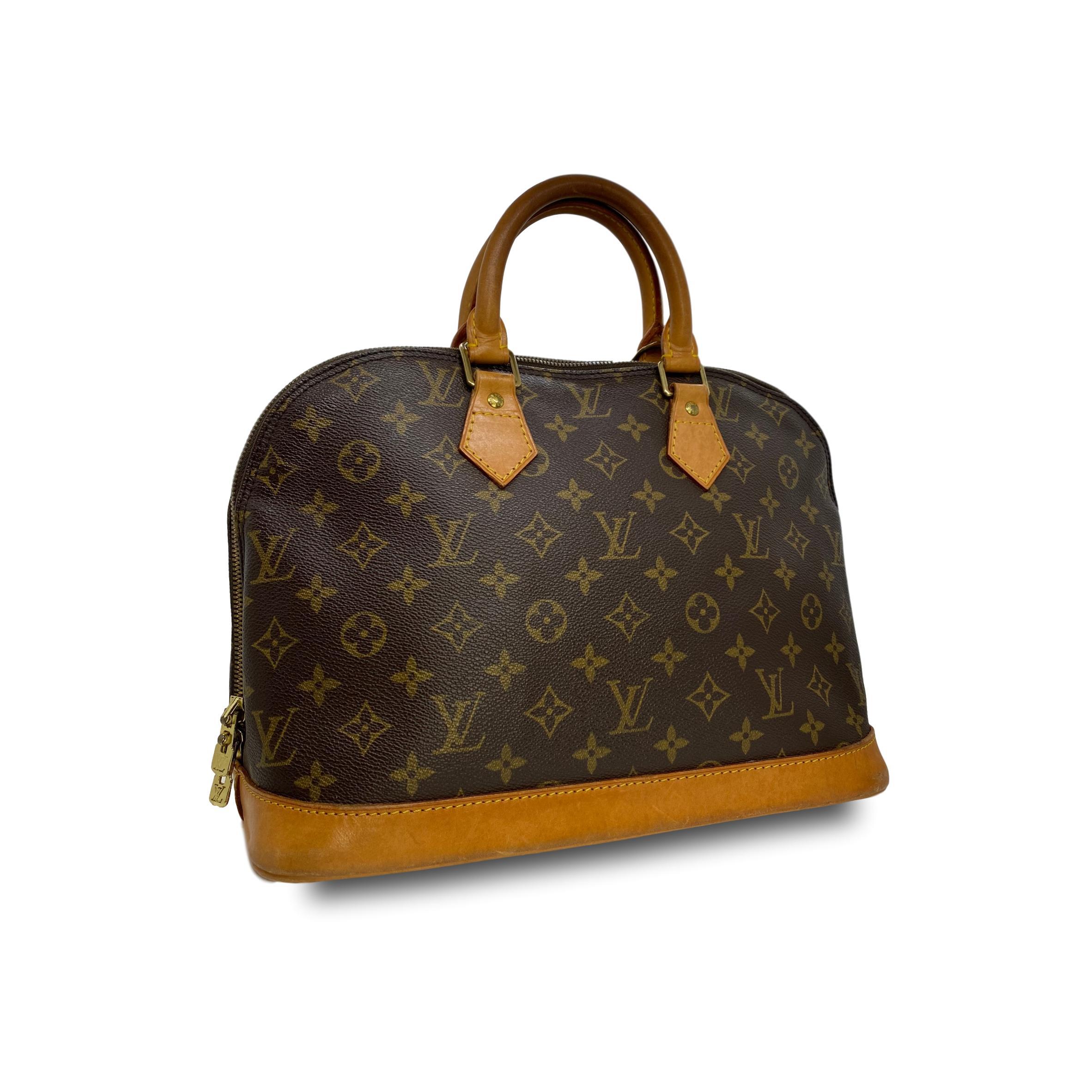 Black Louis Vuitton Alma PM Monogram Top Handle Handbag, France 1994. 