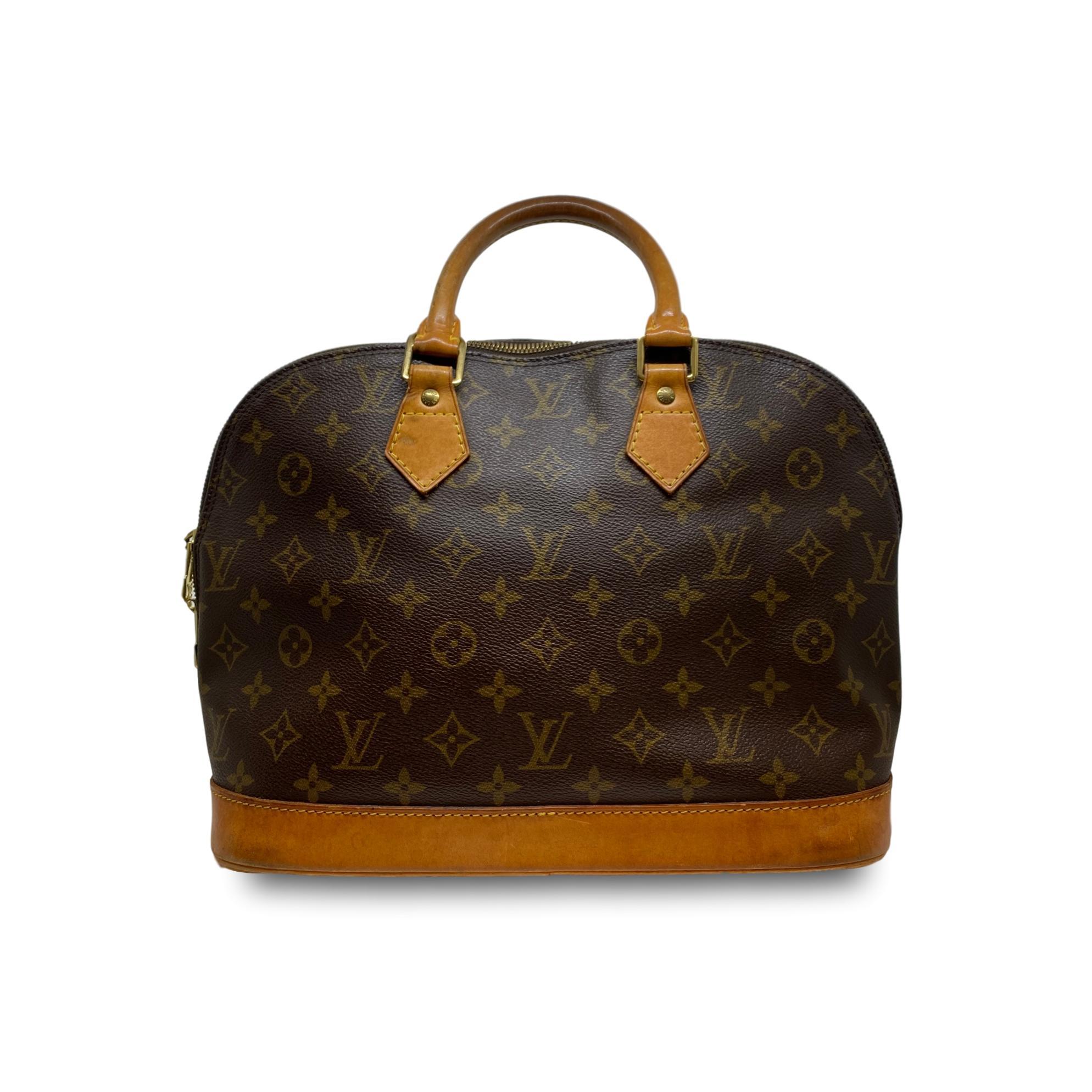 Brown Louis Vuitton Alma PM Monogram Top Handle Handbag, France 1996.