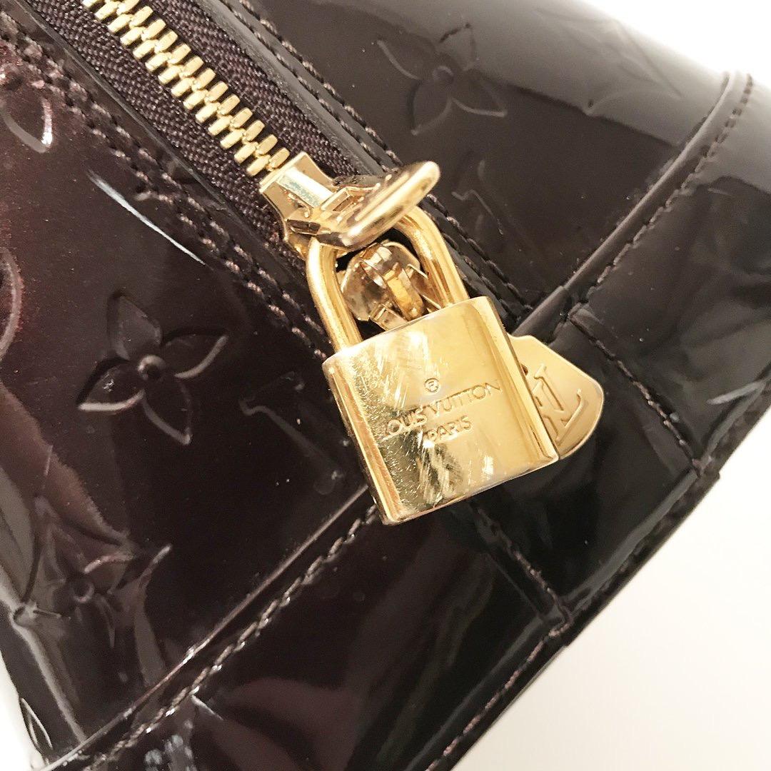 Black Louis Vuitton Alma Vernis Bag 