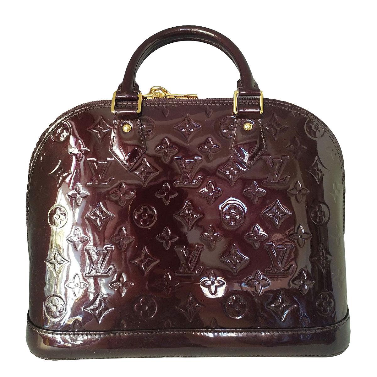 Iconic Alma bag
Monogram patentleather 
Dark plum color
Two handles
Zip closure with golden padlock
Double side internal pocket 
Cm 32 x 25 x 16 (12.5 x 9.8 x 6.2)
With dustbag
Presence of little scratch on exterior part, see pictures
Worldwide