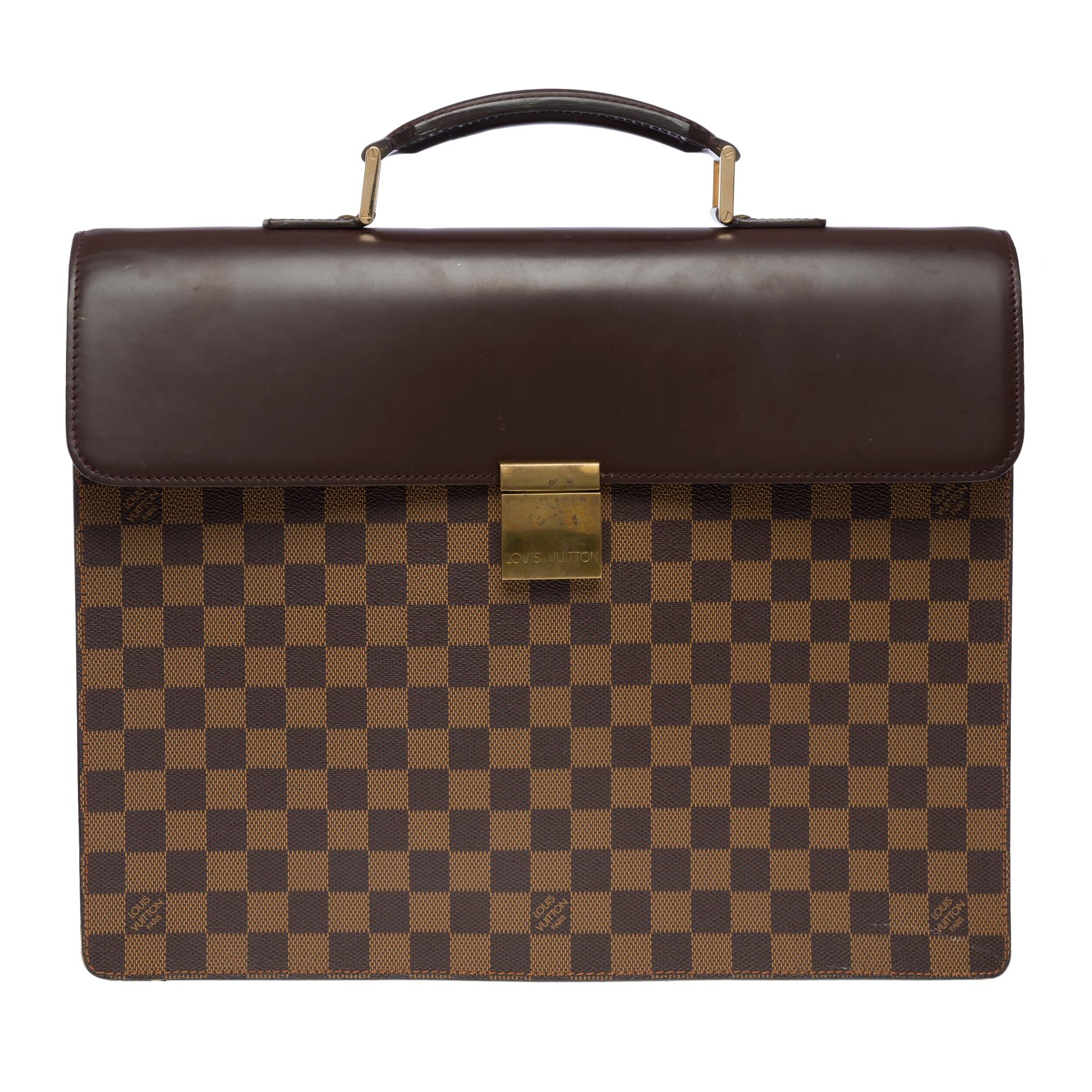 Very​ ​Chic​ ​Louis​ ​Vuitton​ ​Altona​ ​PM​ ​Briefcase​ ​in​ ​Ebony​ ​canvas​ ​and​ ​brown​ ​leather,​ ​golden​ ​brass​ ​trim,​ ​a​ ​brown​ ​leather​ ​handle​ ​for​ ​a​ ​hand​ ​carry​ ​

Closure​ ​with​ ​flap,​ ​clasp​ ​signed​ ​Louis​ ​Vuitton
A​