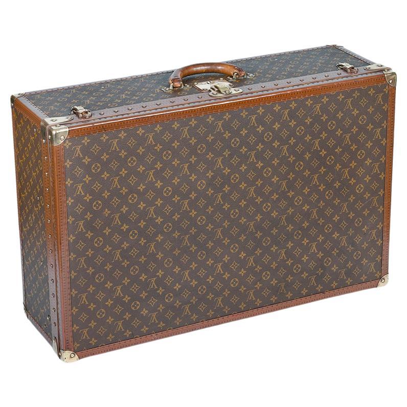 Suitcase Alzer 80, Louis Vuitton. Monogram canvas, bro…