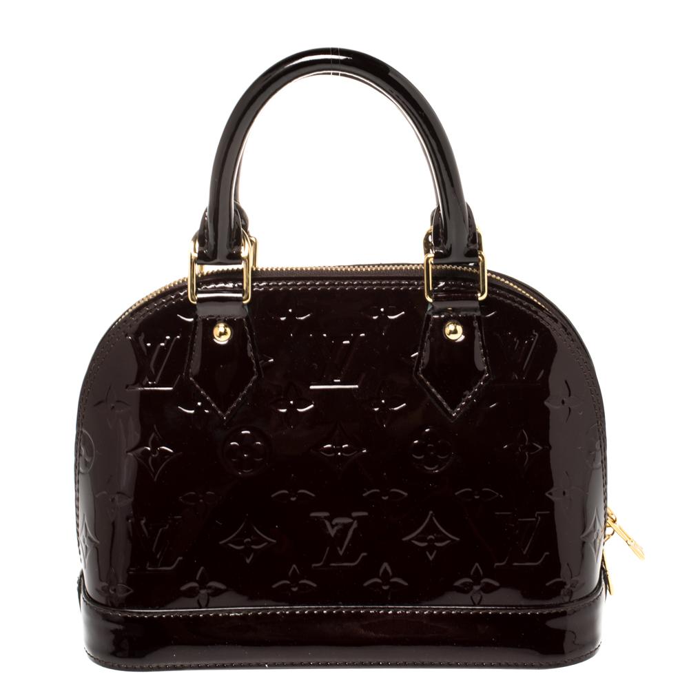 Out of all the irresistible handbags from Louis Vuitton, the Alma is the most structured one. First introduced in 1934 by Gaston-Louis Vuitton, the Alma is a classic that has received love from fashion icons. This piece comes crafted from Amarante