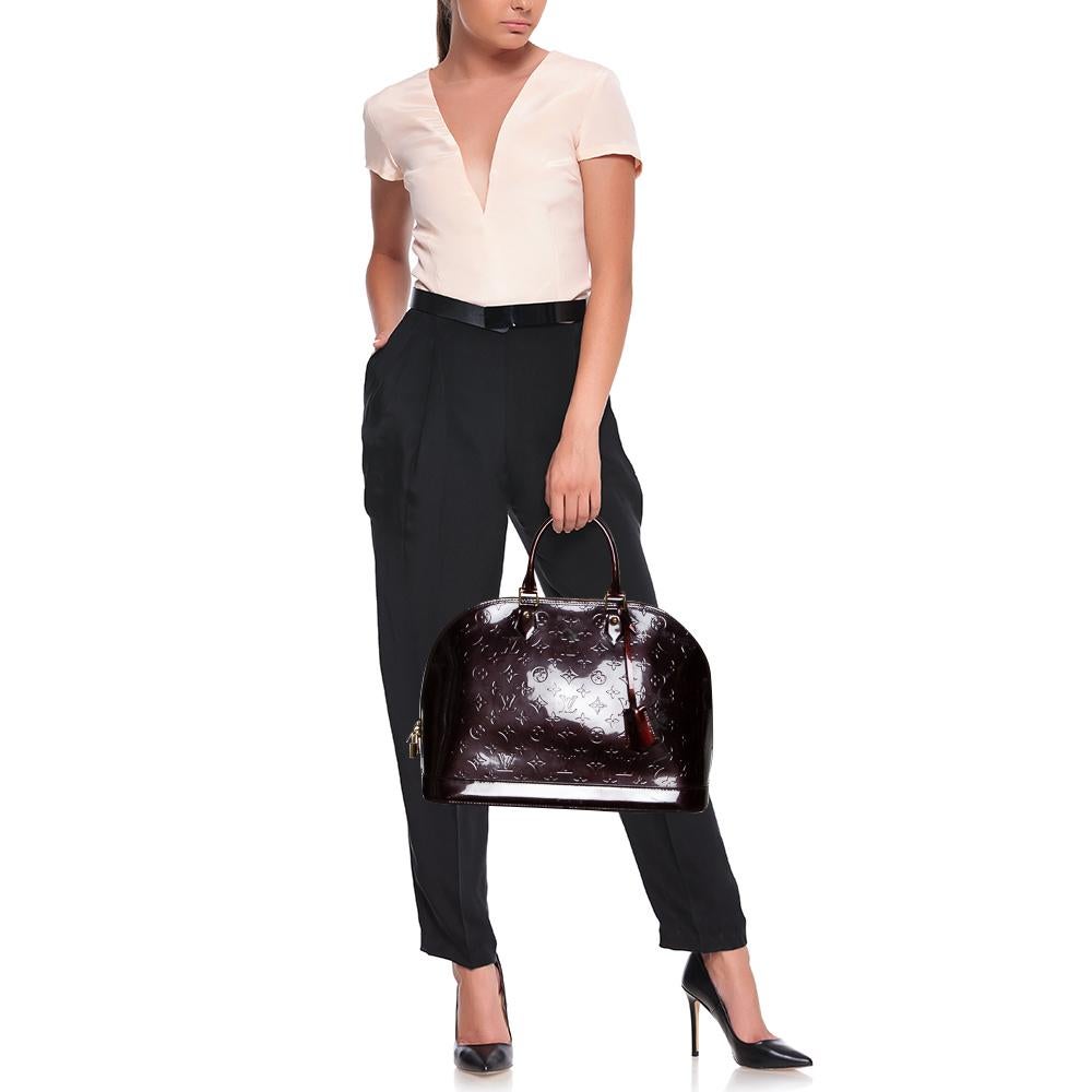 Out of all the irresistible handbags from Louis Vuitton, the Alma is the most structured one. First introduced in 1934 by Gaston-Louis Vuitton, the Alma is a classic that has received love from fashion icons. This piece comes crafted from the