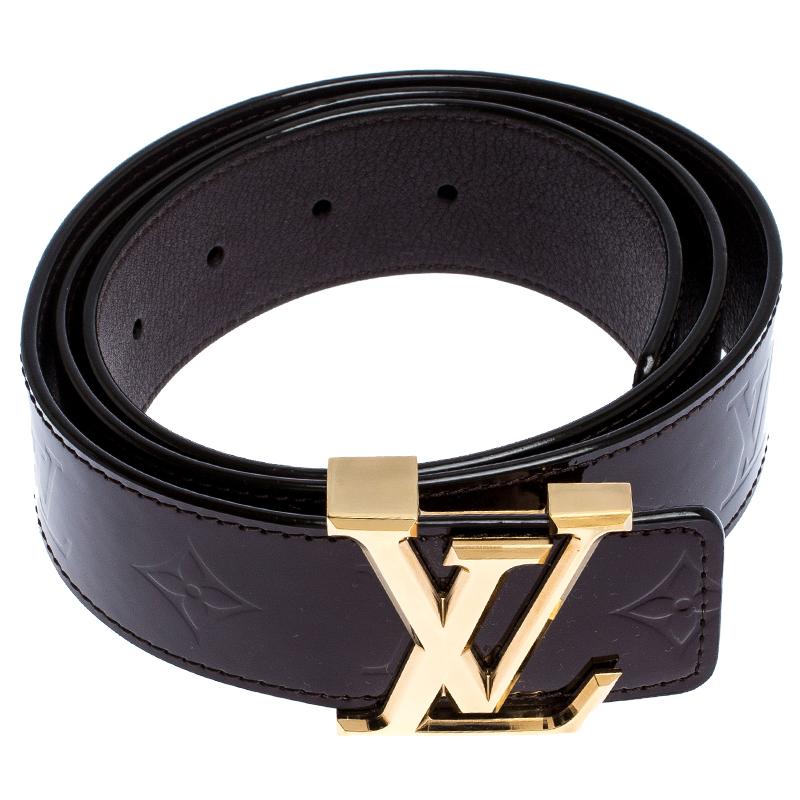 This Louis Vuitton belt has been crafted to a sleek and glossy finish. Made from Monogram Vernis, it features the polished LV logo buckle in gold-tone metal and loopholes for an adjustable fit.

Includes: Original Dustbag

