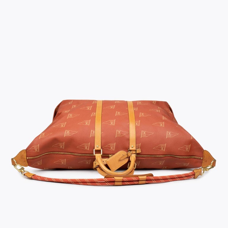Louis Vuitton Small Duffle Bag With Orange Chainsaw