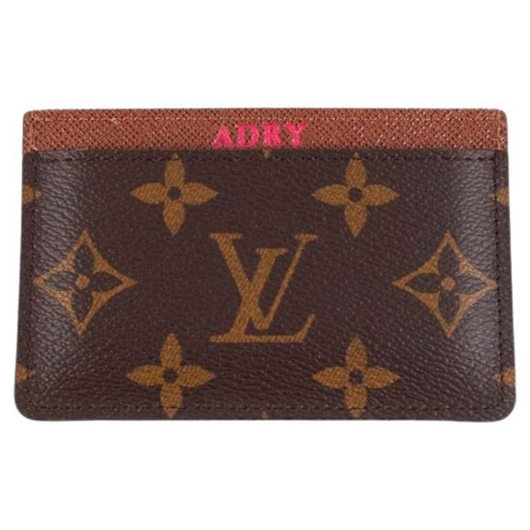 Fake? I googled 'LV wallet with box' and got the 2nd image, same