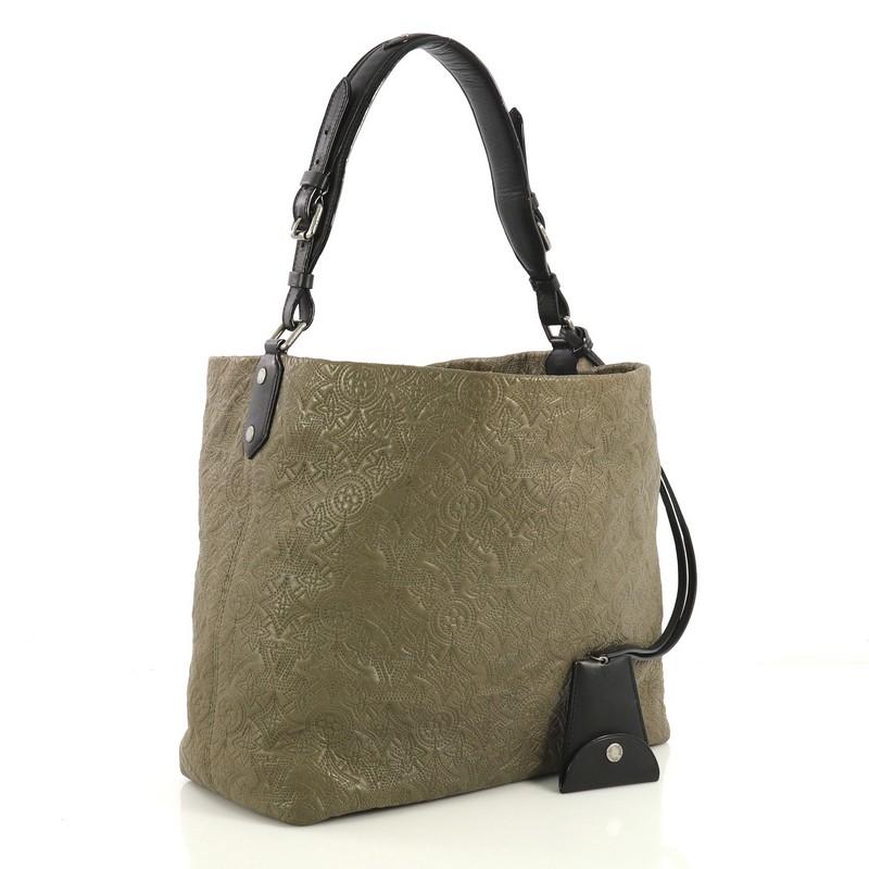 This Louis Vuitton Antheia Hobo Leather PM, crafted from green leather, features a leather top handle, monogram flower embossed stitching, and aged silver-tone hardware. It opens to a neutral microfiber interior with zip and slip pockets.