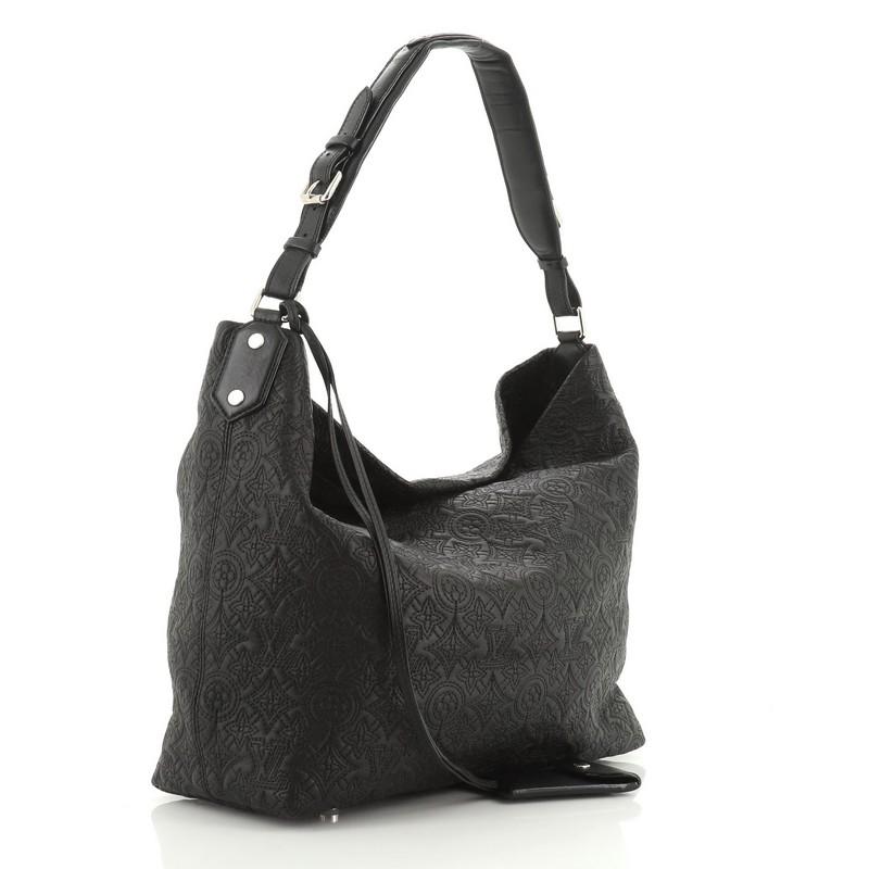 This Louis Vuitton Antheia Hobo Leather PM, crafted from black leather, features a leather top handle, monogram flower embossed stitching, and silver-tone hardware. It opens to a black microfiber interior with zip and slip pockets. Authenticity code
