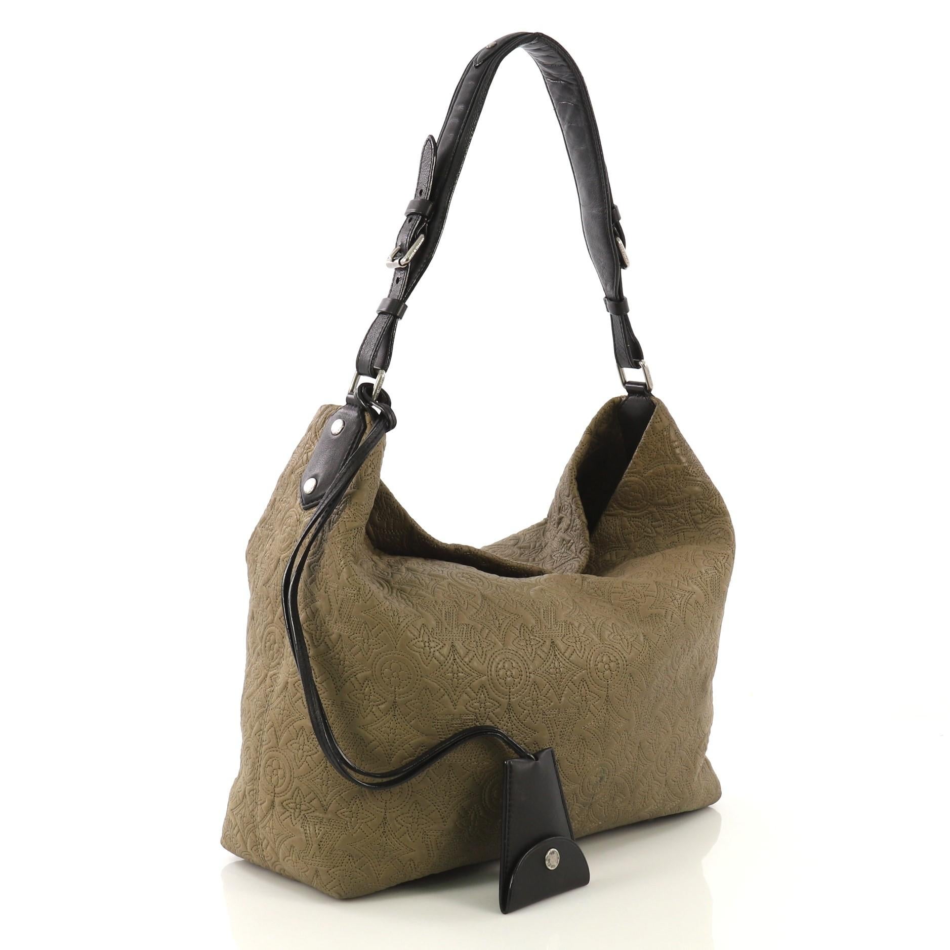 This Louis Vuitton Antheia Hobo Leather PM, crafted from green leather, features a leather top handle, monogram flower embossed stitching, and aged silver-tone hardware. It opens to a gray microfiber interior with zip and slip pockets. Authenticity
