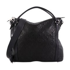 Louis Vuitton Antheia Ixia Handbag Leather MM