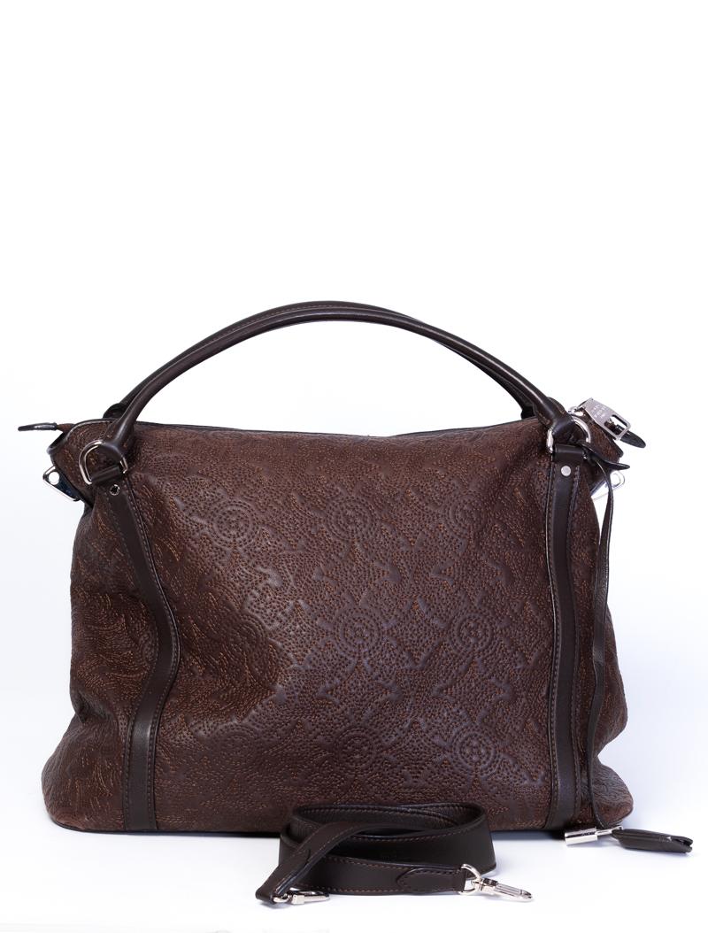 This bag is made of brown soft lambskin Antheia leather and embroidered with an ornate version of the monogram print. Featuring rolled leather handles, a long leather key/lock holder, sliver tone hardware, top zip closure, chocolate alcantara