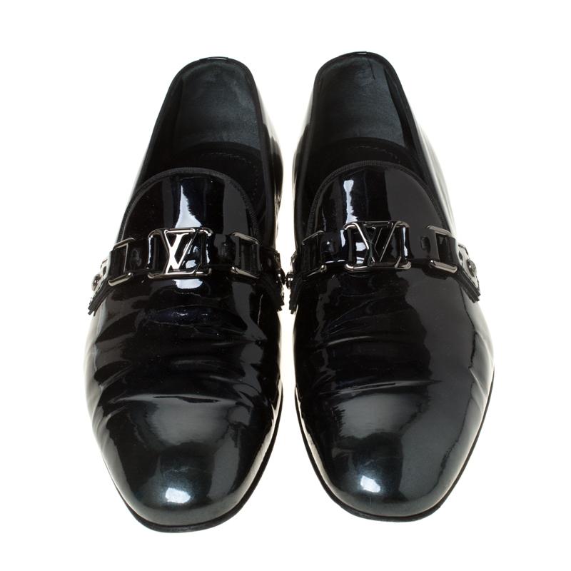 Crafted from patent leather and styled into a luxe shape, this pair of loafers by Louis Vuitton brings a blend of luxury and comfort. They feature the signature LV on the uppers in silver-tone and leather-lined insoles. The loafers will enhance all