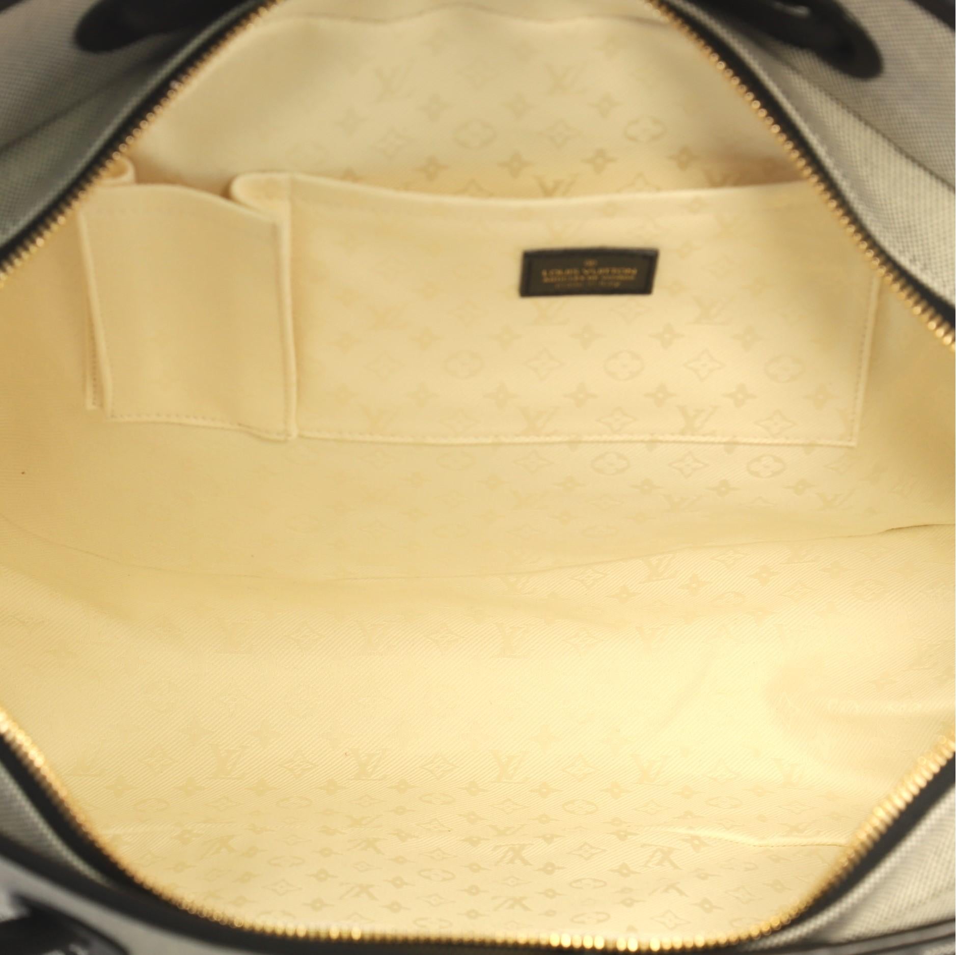 Women's Louis Vuitton Articles de Voyage Malles Handbag Canvas
