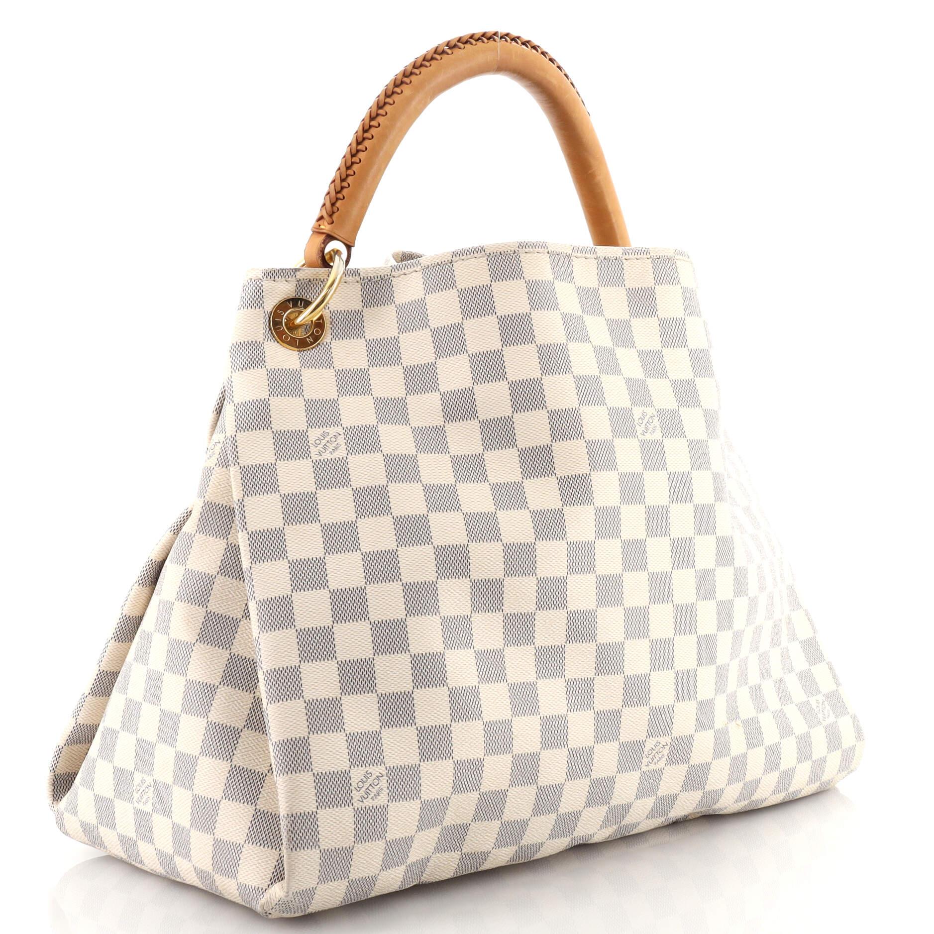 Condition: Marketplace Only. Illegible code. Odor in interior. Creasing on exterior and handle, heavy wear and peeling on base corners, heavy darkening, wear, scuffs and watermarks on leather trims and handle. Moderate wear, marks and pen marks in