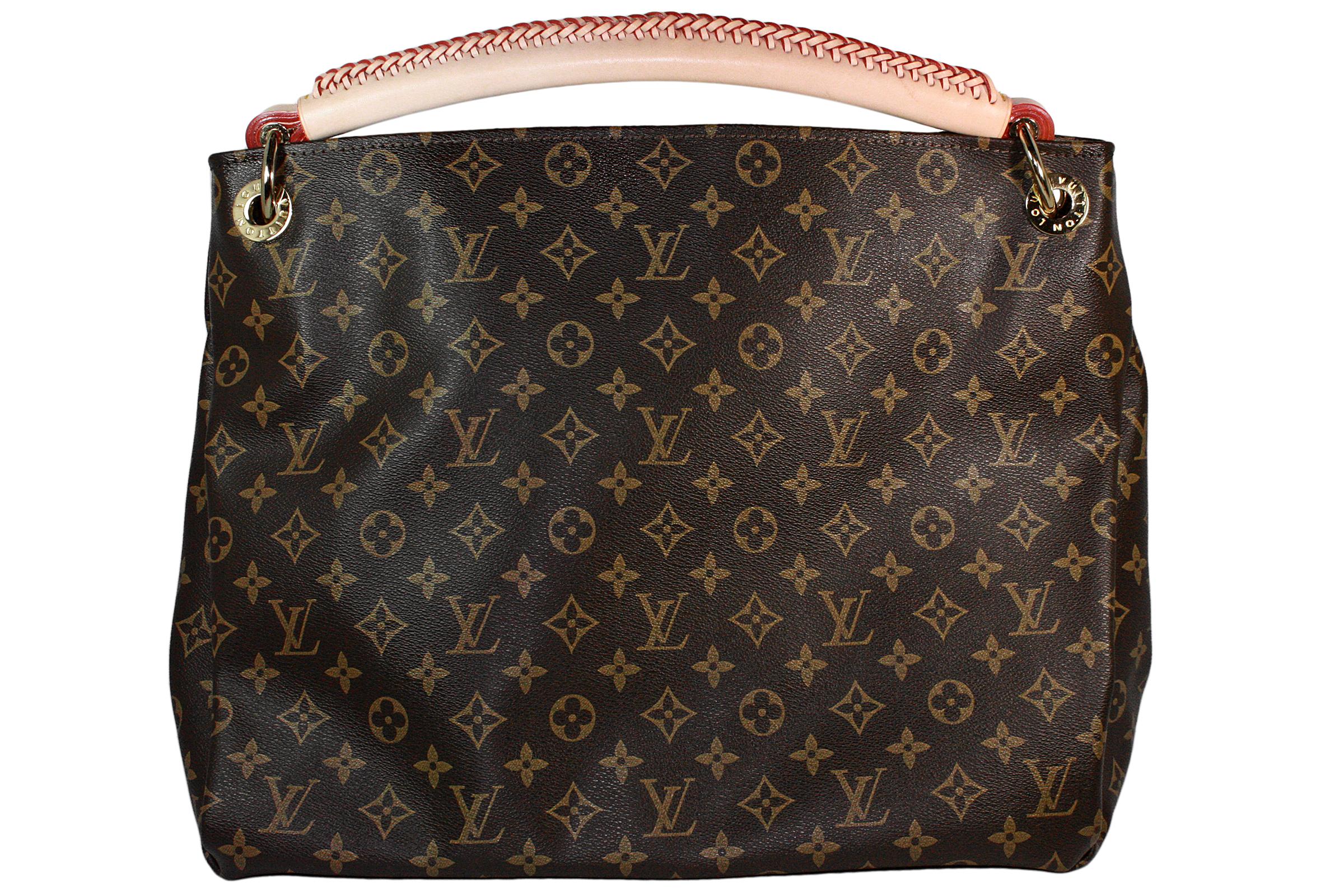 Louis Vuitton shoulder bag
Made in France 
Classic monogram pattern 
Gold hardware
Braided leather handle 
Soft beige suede lining 
Zippered interior pocket and card slots 
Comes with yellow dustbag 