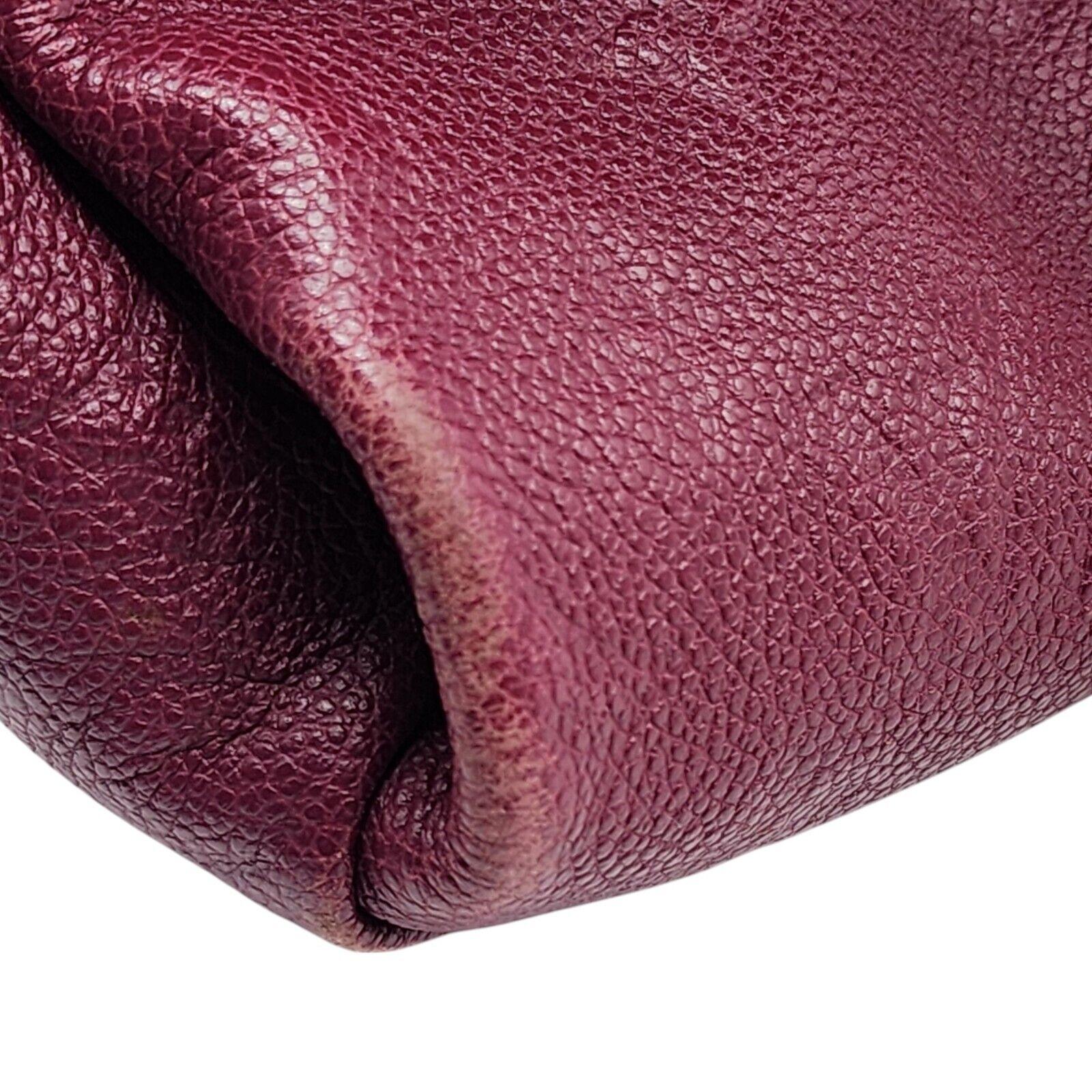 Louis Vuitton Artsy MM Empreinte LV Monogram Bag Leather in Aurore Purple In Excellent Condition In Los Angeles, CA