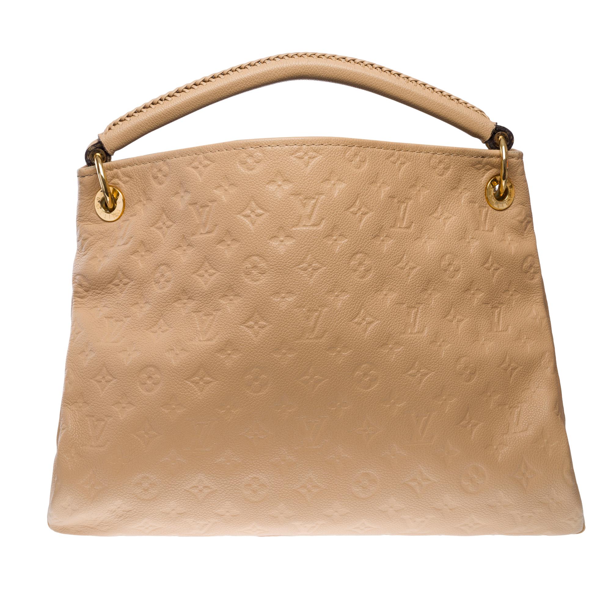 Beautiful​ ​Louis​ ​Vuitton​ ​Artsy​ ​MM​ ​tote​ ​bag​ ​in​ ​beige​ ​monogram​ ​embossed​ ​leather,​ ​with​ ​gold-tone​ ​metal​ ​hardware,​ ​a​ ​beige​ ​braided​ ​leather​ ​handle​ ​for​ ​hand​ ​or​ ​shoulder​ ​carry

Beige​ ​striped​ ​canvas​