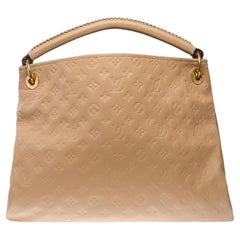 Sac Hobo Artsy MM en cuir de veau gaufré beige monogrammé Louis Vuitton
