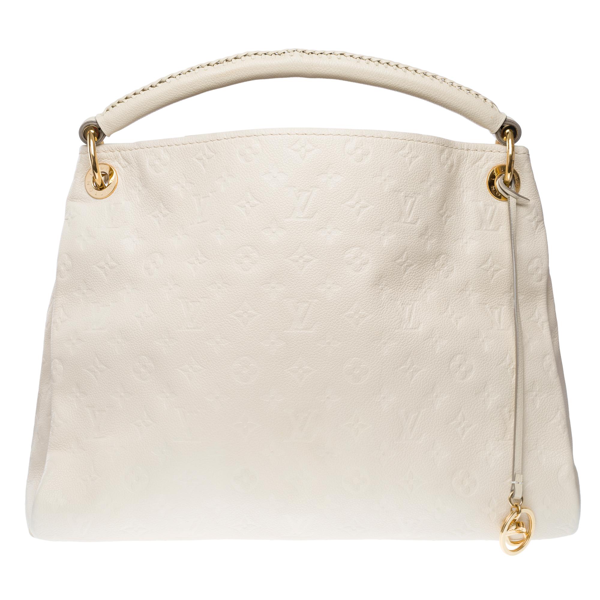Beautiful​ ​Louis​ ​Vuitton​ ​Artsy​ ​MM​ ​Tote​ ​bag​ ​in​ ​White​ ​snow​ ​monogram​ ​embossed​ ​leather​ ​,​ ​with​ ​gold-tone​ ​metal​ ​hardware,​ ​a​ ​white​ ​braided​ ​leather​ ​handle​ ​for​ ​hand​ ​or​ ​shoulder​ ​carry

White​ ​striped​
