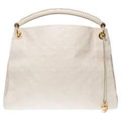 Sac Hobo Artsy MM en cuir de veau gaufré monogrammé blanc Louis Vuitton