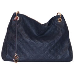 Louis Vuitton Artsy MM Monogram Empreinte Navy und rote Einkaufstasche