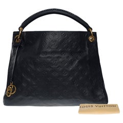 Used Louis Vuitton Artsy MM Hobo bag in dark blue monogram calfskin leather, GHW