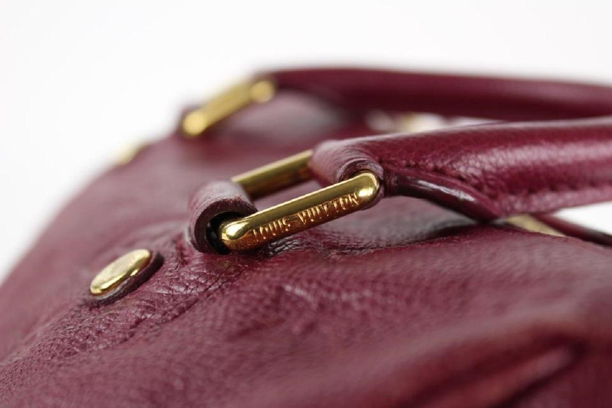 Women's Louis Vuitton Aurore Empreinte Leather Speedy Bandouliere 25 Bag with Strap For Sale
