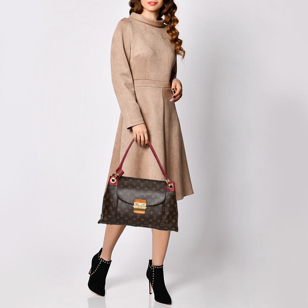 The Olympe bag is cut from Aurore monogram canvas and is designed by the renowned house of Louis Vuitton. A simple yet stylish addition to your accessory collection, this bag has two shoulder straps and a main compartment with a zipped separator.