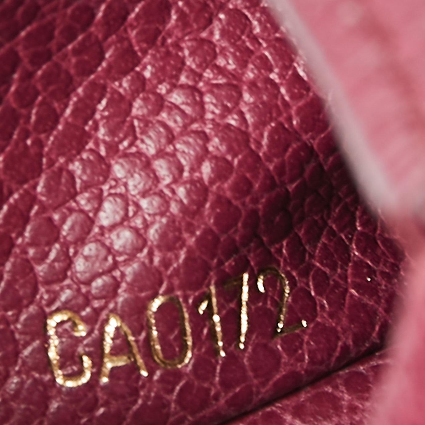 Louis Vuitton Aurore Monogram Empreinte Leather Flap Phone Case 2