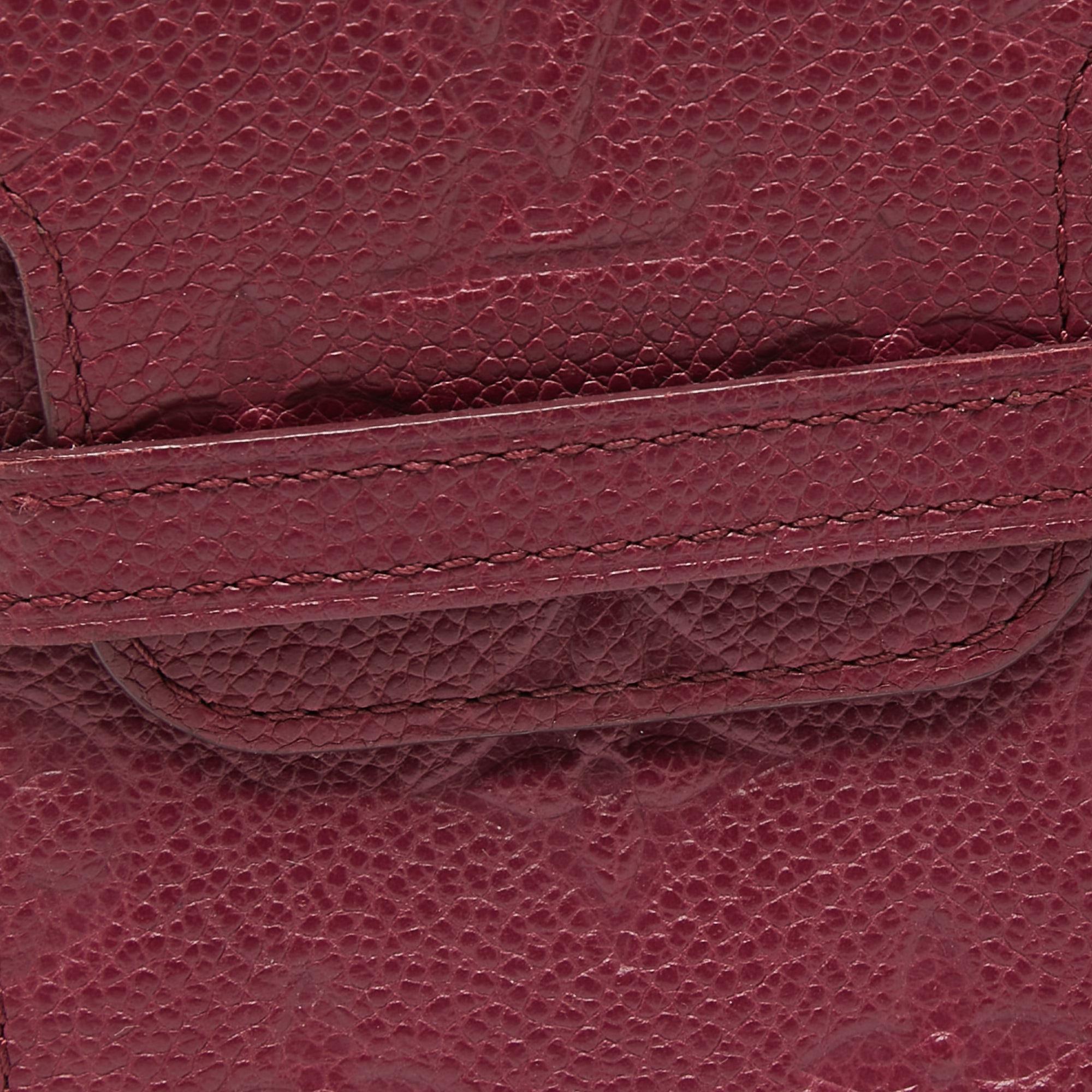 Louis Vuitton Aurore Monogram Empreinte Leather Flap Phone Case 3