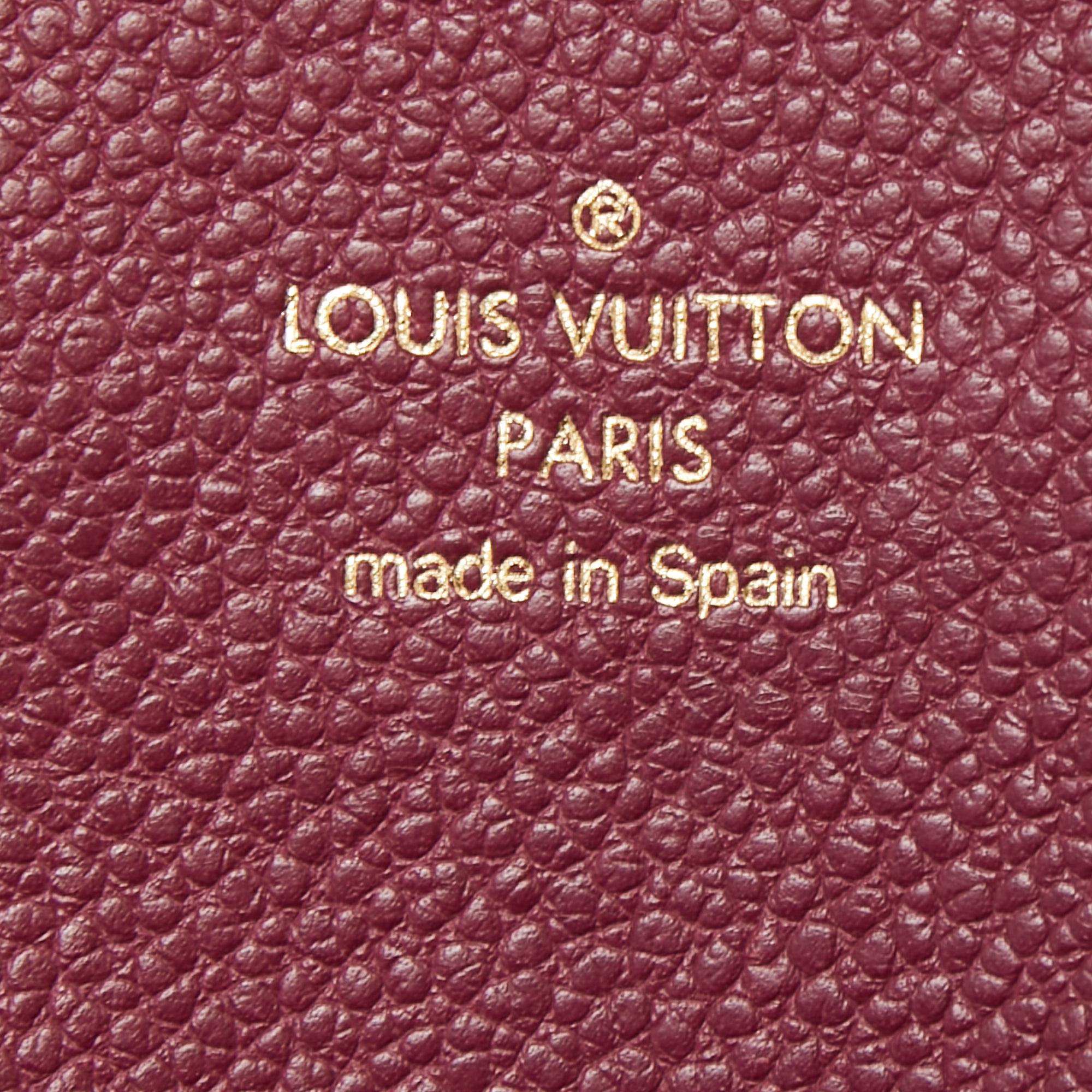 Louis Vuitton Aurore Monogram Empreinte Leather Flap Phone Case 4