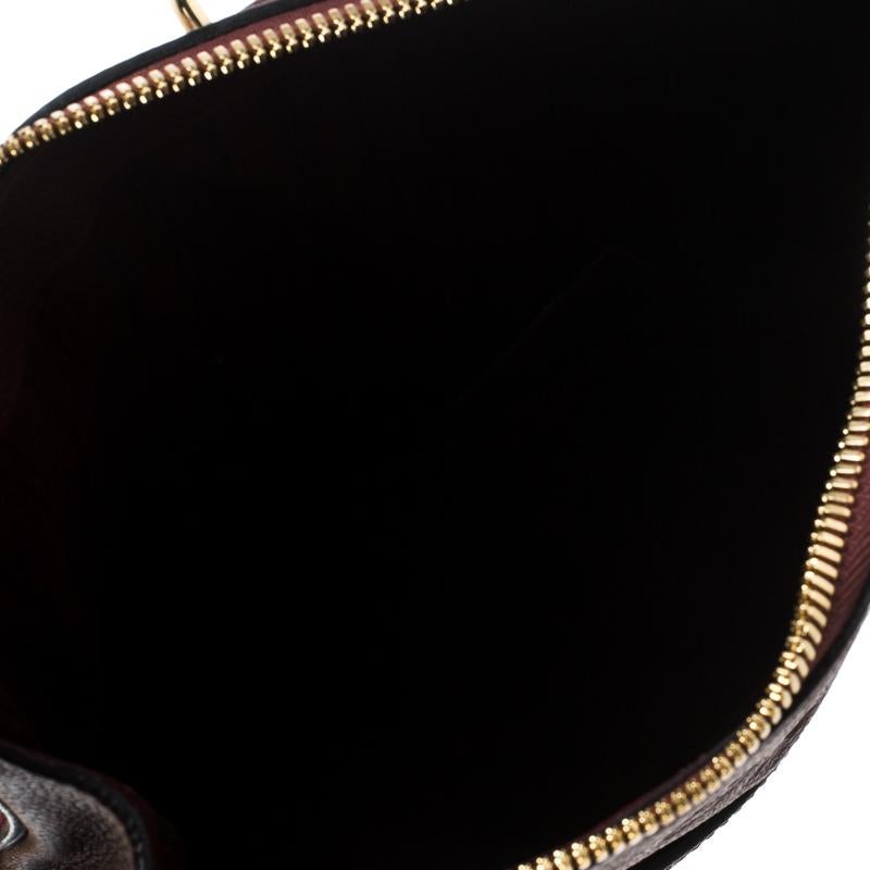 Louis Vuitton Aurore Monogram Empreinte Leather Petillante Clutch 3