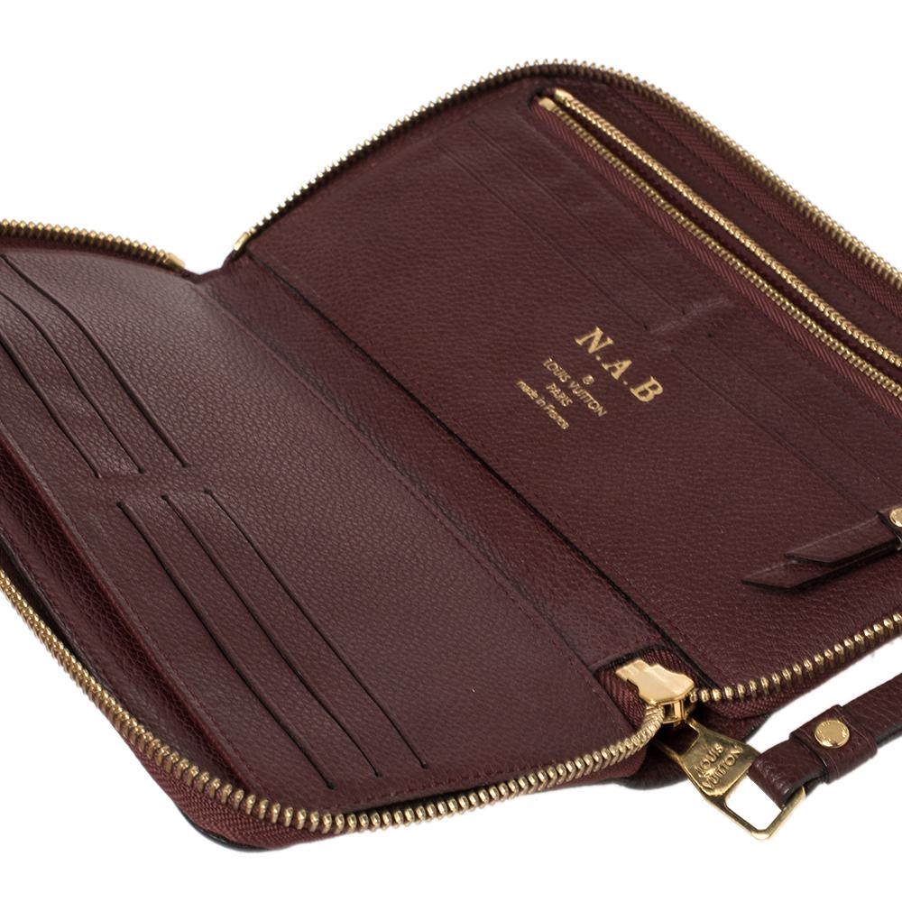 Women's Louis Vuitton Aurore Monogram Empreinte Leather Zippy Wallet