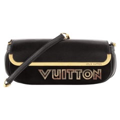 Avantgarde-Pochette von Louis Vuitton aus Leder und Wildleder