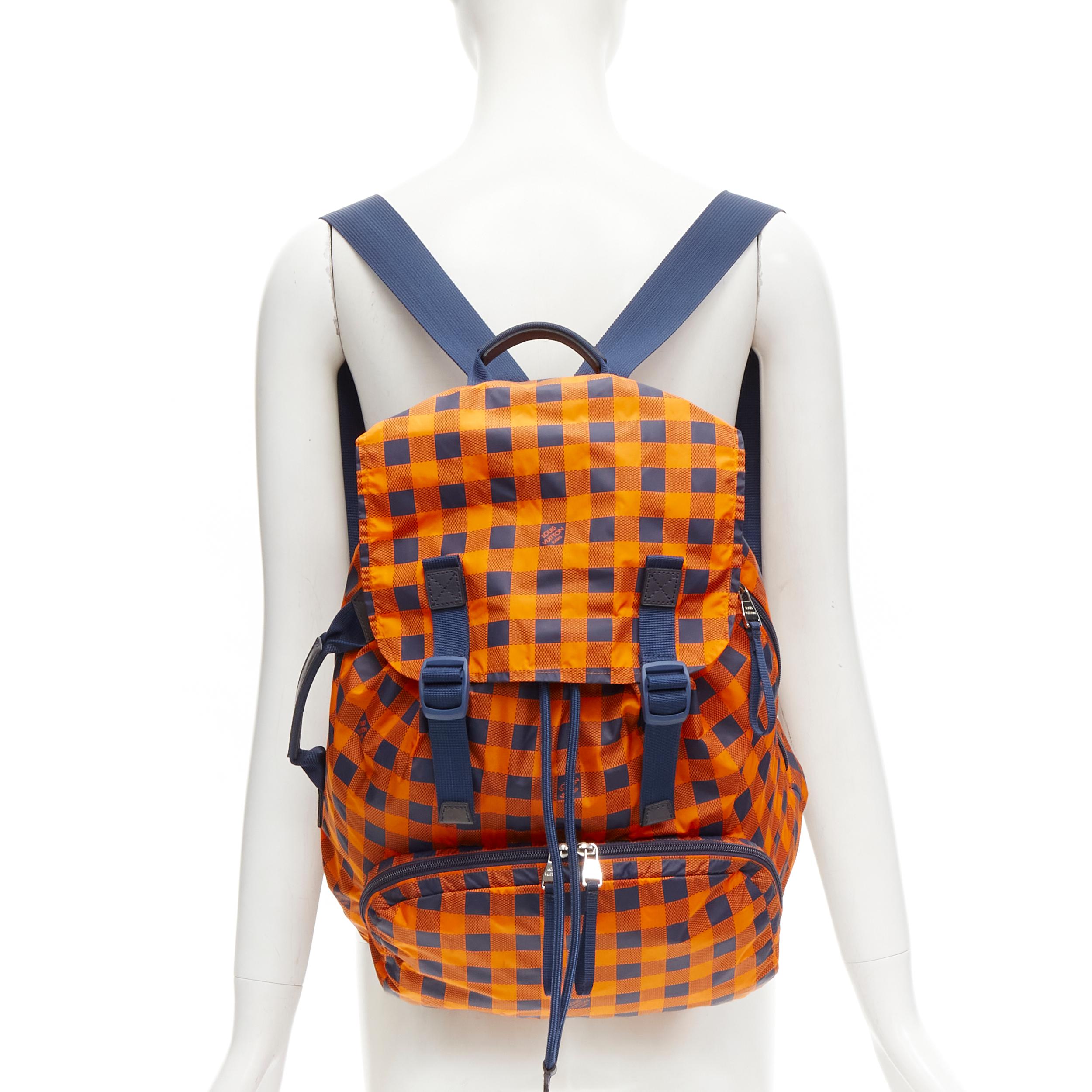LOUIS VUITTON Aventure orange blue LV Damier nylon foldable backpack
Reference: CNLE/A00199
Brand: Louis Vuitton
Designer: Marc Jacobs
Collection: Cup 2012
Material: Nylon, Leather
Color: Orange, Navy
Pattern: Checkered
Closure: Drawstring
Lining: