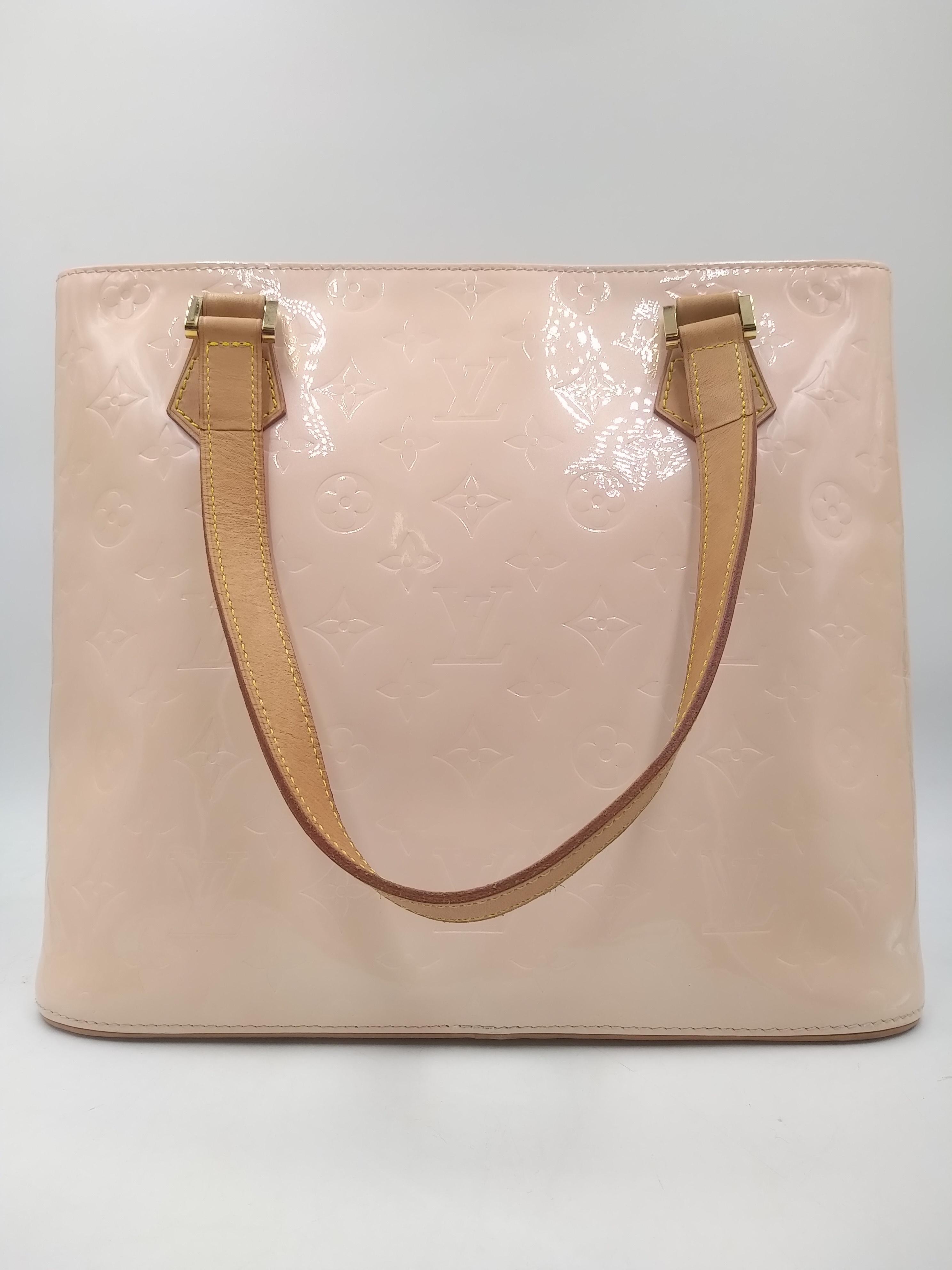 Louis Vuitton Baby Pink Monogram Vernis Houston Bag, 2004
-100% authentic Louis Vuitton
- Pale pink monogram embossed coated leather with natural cowhide trim
- Double flat natural cowhide handles
- Single zip closure
- Leather inside
- One zip