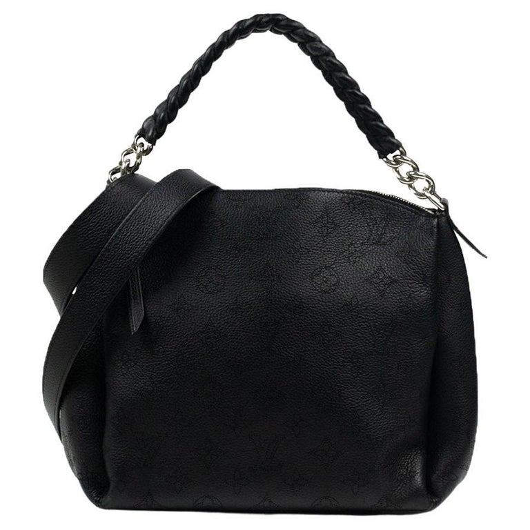 LOUIS VUITTON, Babylone in black leather For Sale