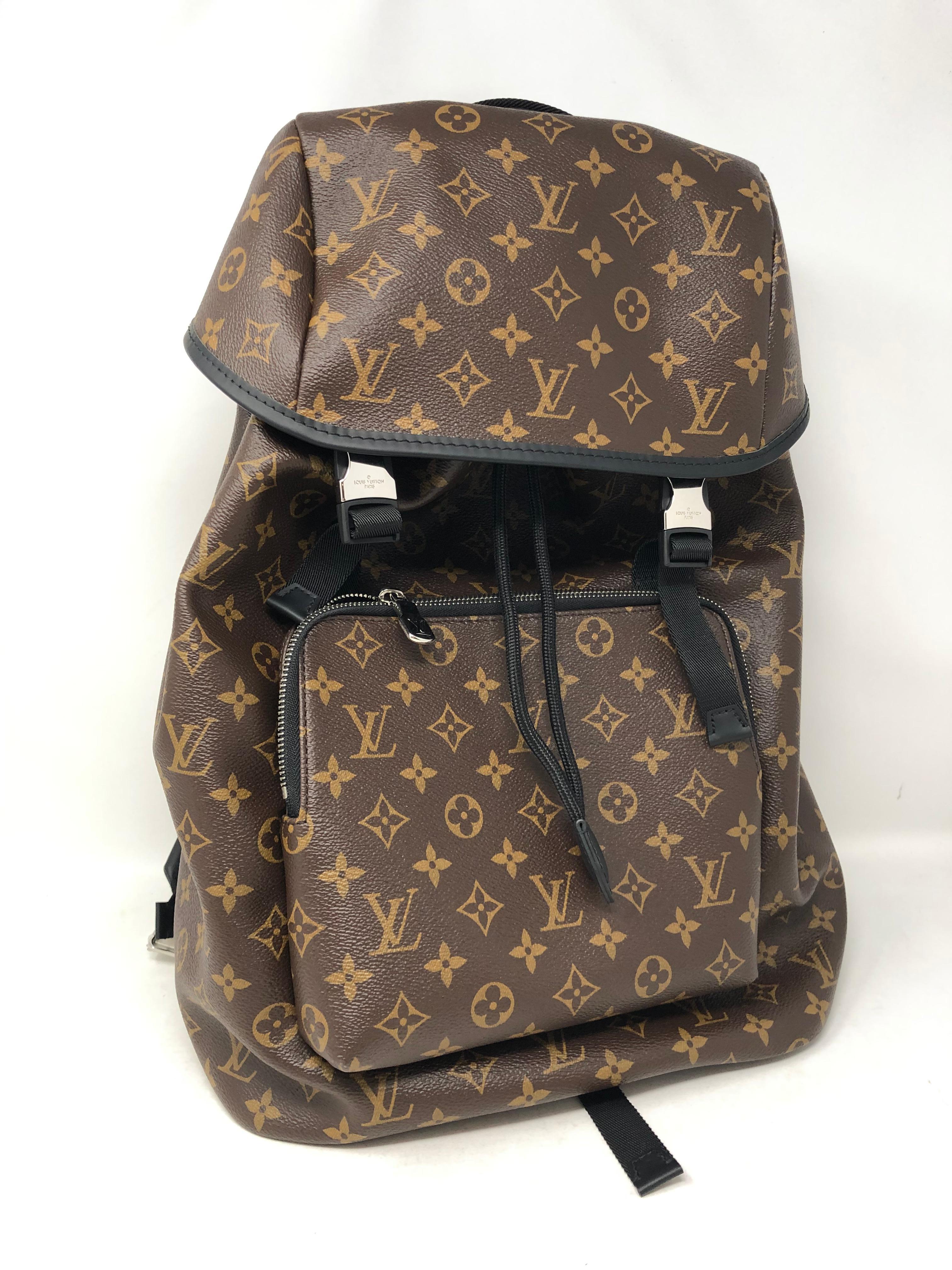 Louis Vuitton backpack Zack Monogram Macassar Brown. Brand new condition. Never used. 18.5 H, 12 wide, 6.5 depth.  Roomy size backpack for all your needs. Guaranteed authentic. 