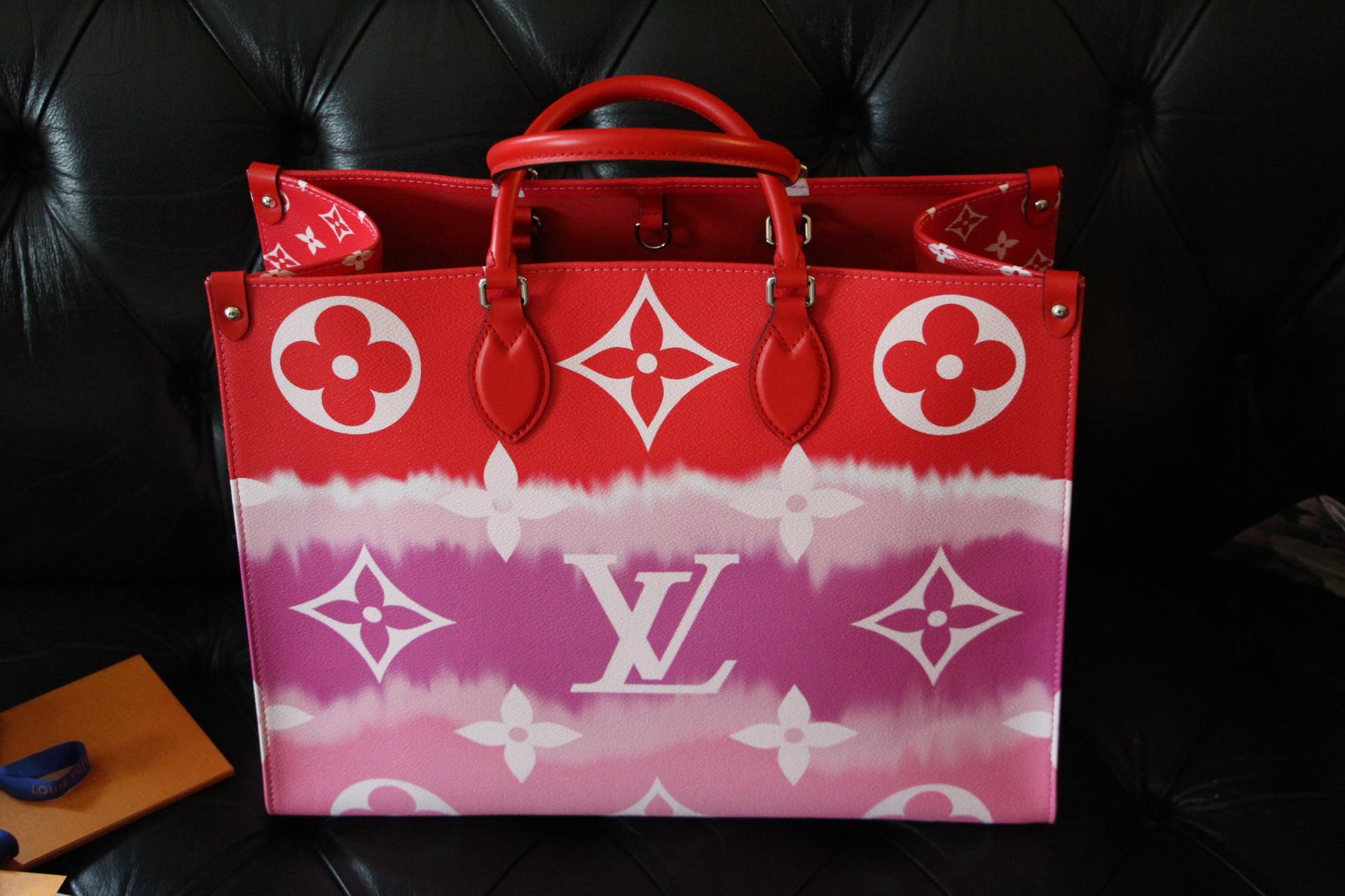 This magnificent brand new on the Go Escale bag by Louis Vuitton is red, purple and pink.

Monogram coated canvas
Cowhide-leather trim
Textile lining
Silver-color hardware
2 Toron top handles for hand or elbow carry
2 long leather shoulder straps