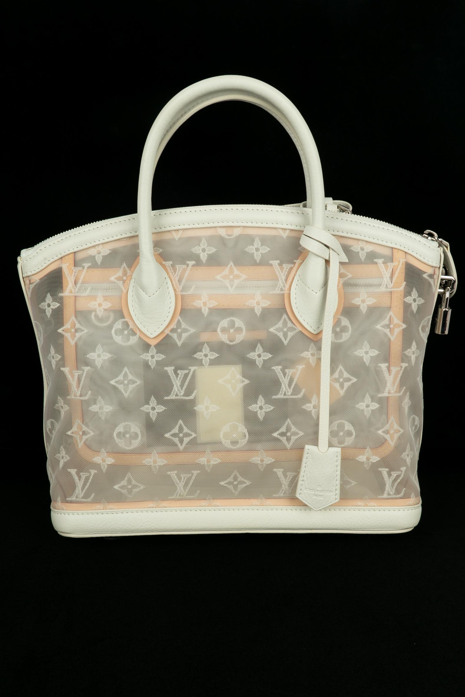 Louis Vuitton bag 'Lockit East West' Summer 2012 im Zustand „Hervorragend“ im Angebot in SAINT-OUEN-SUR-SEINE, FR