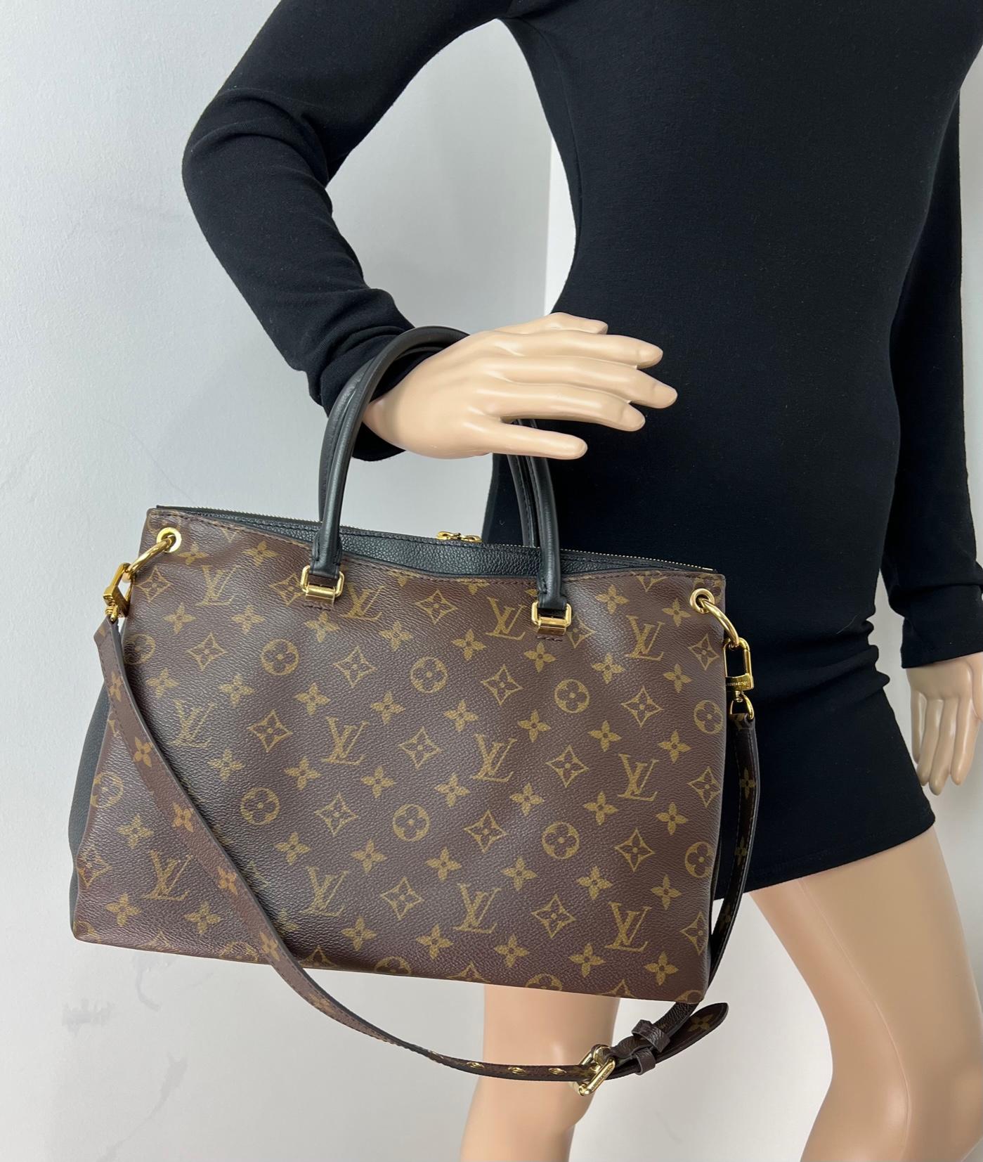 Pre-Owned  100% Authentic
Louis Vuitton Monogram Pallas MM Noir Leather
W/added Non LV Felt insert to help keep shape
and organize!
RATING: B  very good, well maintained,
shows minor signs of wear
MATERIAL: monogram canvas, leather
STRAP: LV