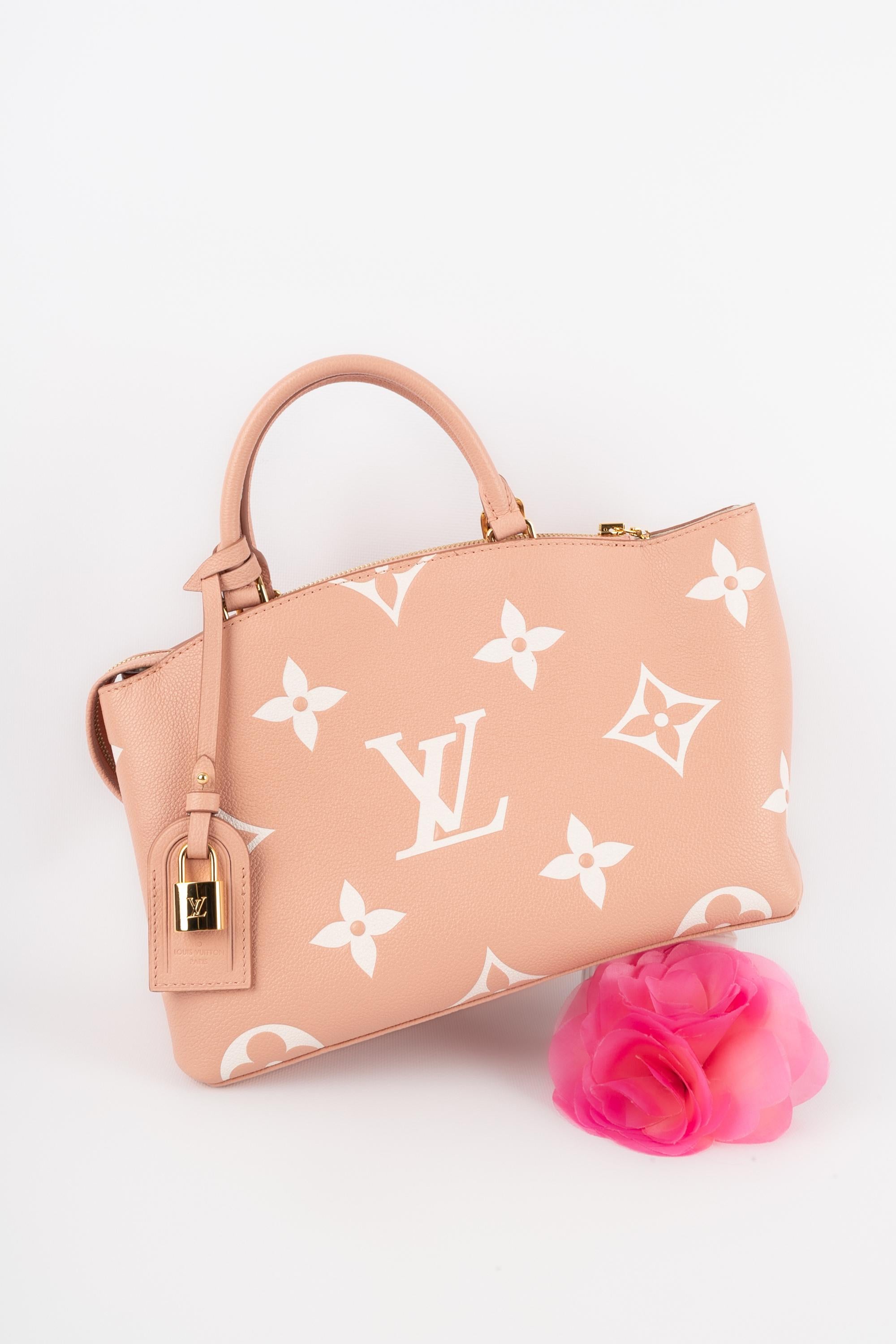 Orange Louis Vuitton bag Petit Palais