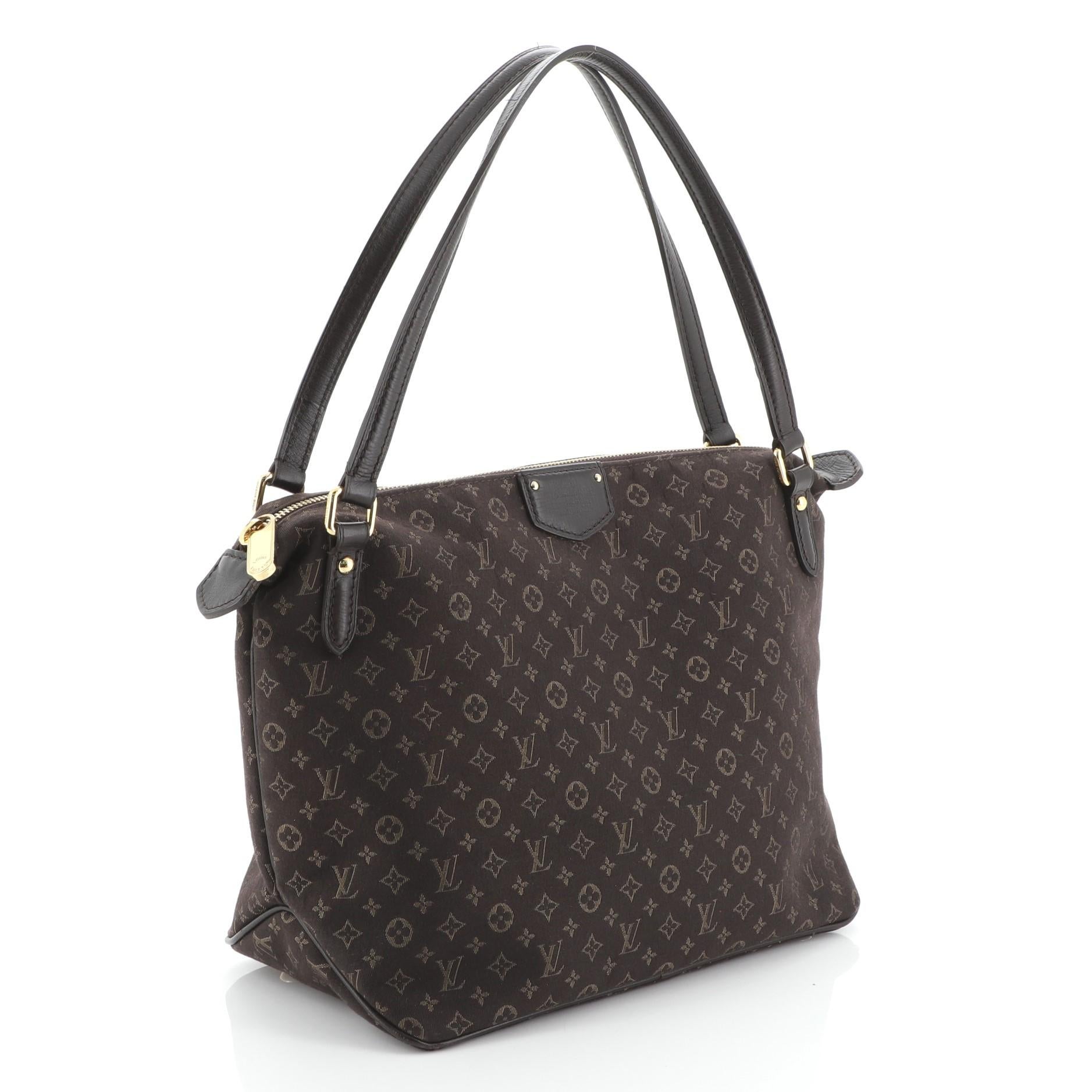 This Louis Vuitton Ballade Handbag Monogram Idylle PM, crafted from brown monogram idylle, features dual flat leather handles, leather trim, protective base studs and gold-tone hardware. Its zip closure opens to a purple fabric interior with zip and