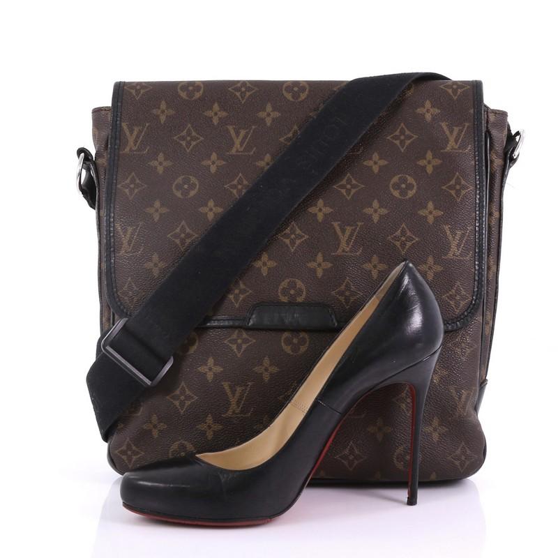 This Louis Vuitton Bass Bag Macassar Monogram Canvas MM, crafted in brown macassar monogram coated canvas, features an adjustable canvas strap, black leather trim, exterior back zip pocket, and silver-tone hardware. Its flap top with two hidden