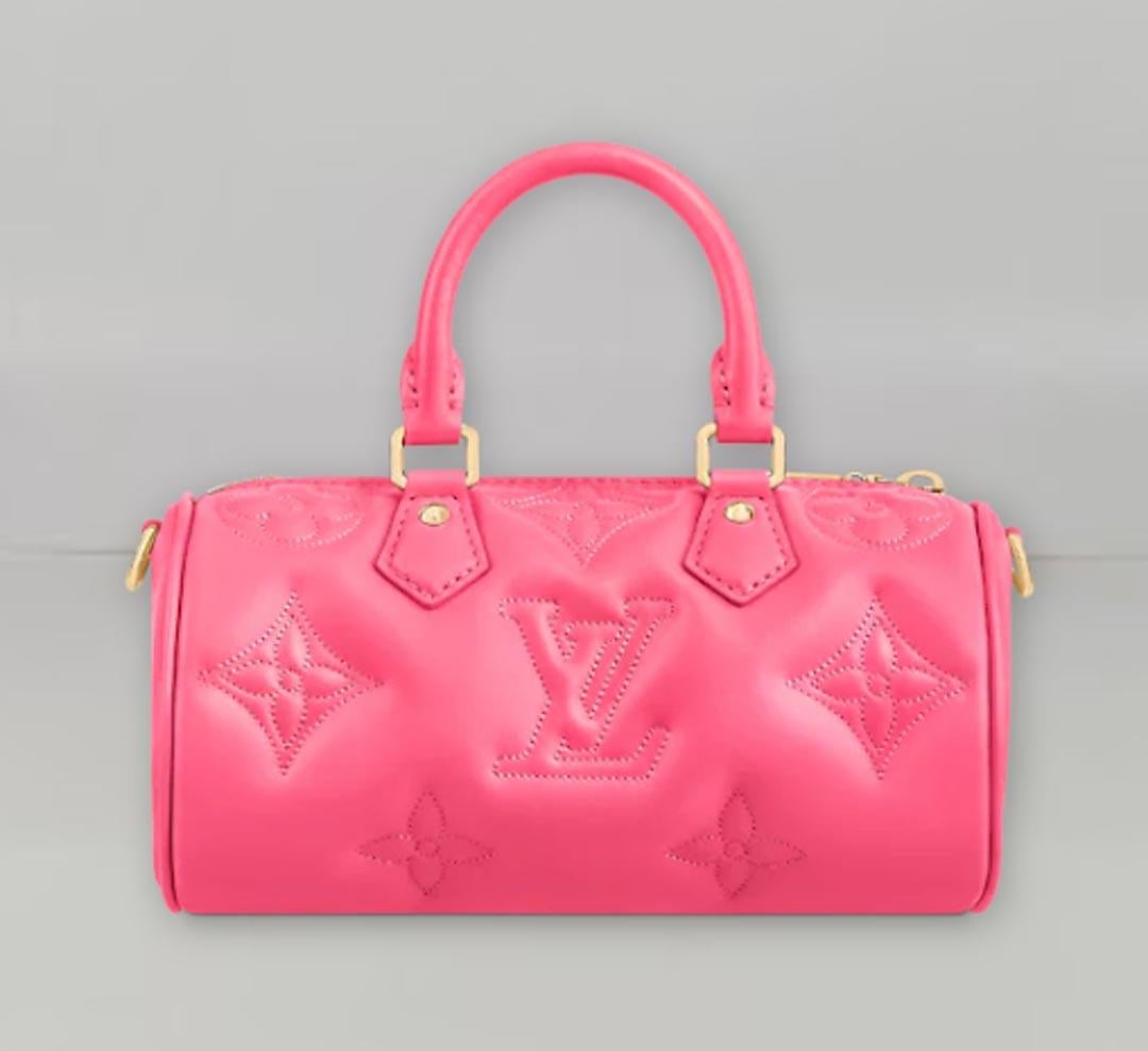 Crafted in supple quilted calfskin, this compact and sporty Papillon BB bag features Louis Vuitton's classic embroidered Monogram pattern. It features a detachable gold chain, a detachable shoulder strap and rolled leather top handles for a variety