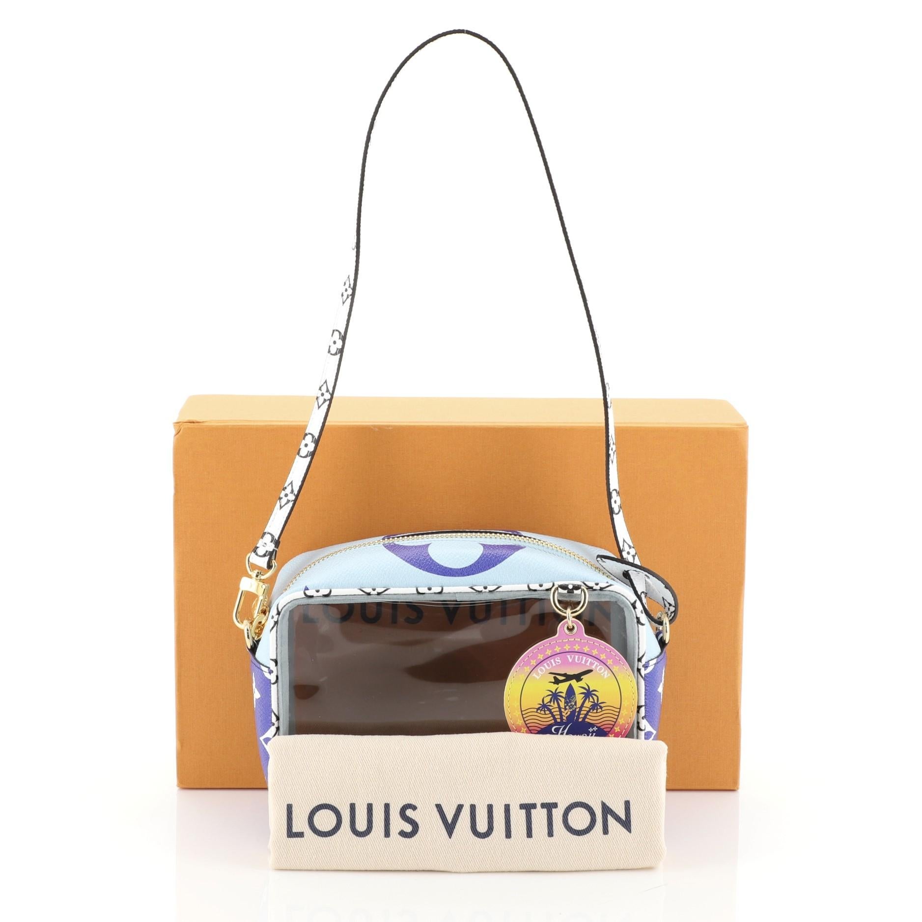 This Louis Vuitton Beach Pouch Limited Edition Cities Colored Monogram Giant, crafted from blue monogram coated canvas and PVC, features a flat top handle and gold-tone hardware. Its zip closure opens to a blue microfiber and PVC interior.