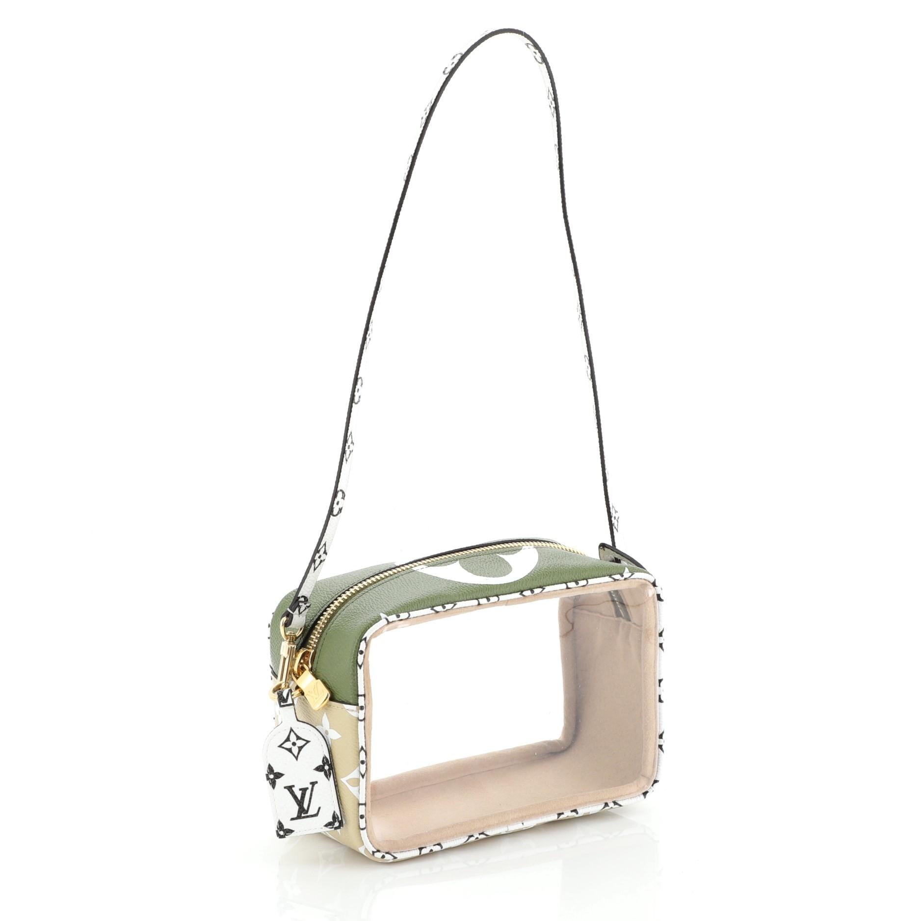 This Louis Vuitton Beach Pouch Limited Edition Colored Monogram Giant, crafted from green monogram coated canvas and PVC, features a flat top handle and gold-tone hardware. Its zip closure opens to a brown microfiber and PVC interior. Authenticity