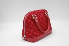 Louis Vuitton bébé Alma in red satin