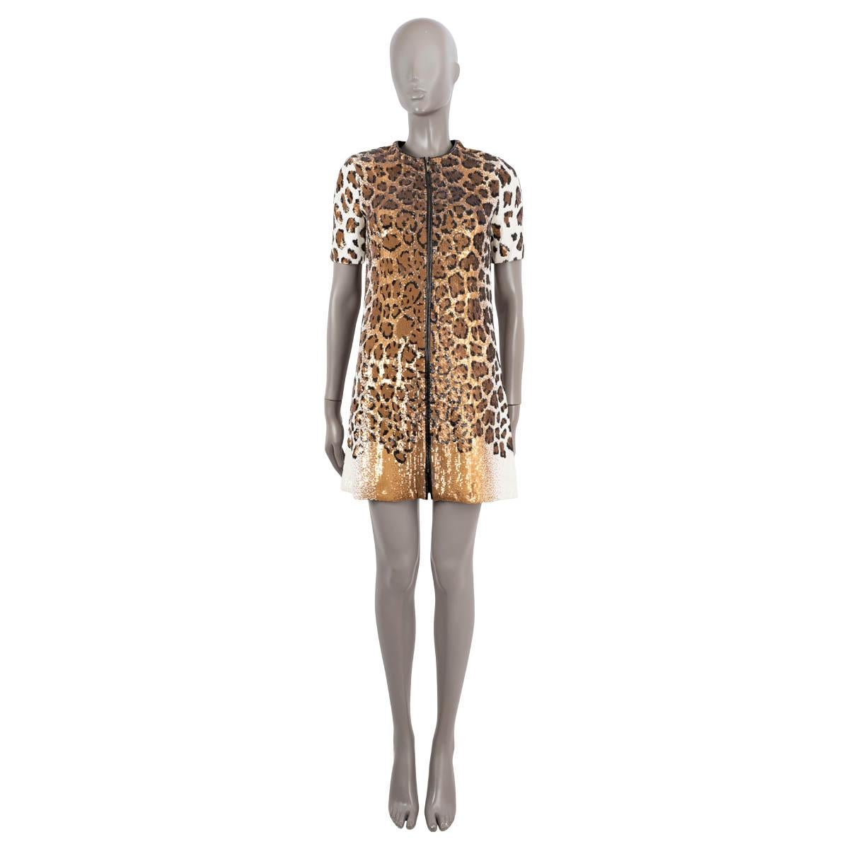 100% authentic Louis Vuitton leopard shift dress in beige, brown, black and white sequins polyester (100%). Features short sleeves and a crewneck. Closes with zipper down the front and is  lined in silk (100%). Has been worn and is in excellent